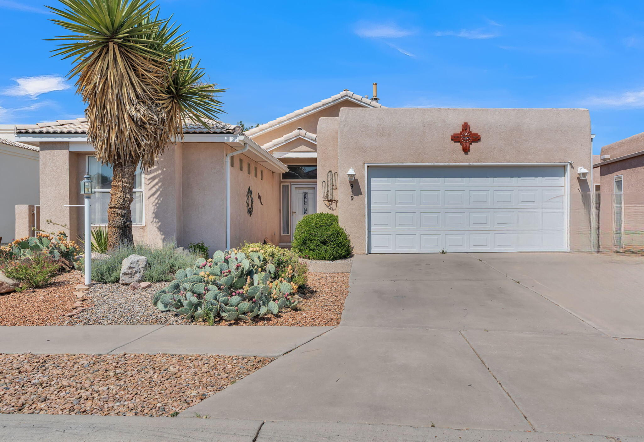 Step into a sun-drenched haven with an abundance of natural light pouring through numerous skylights, creating a warm and inviting atmosphere throughout. This stunning home, nestled against a serene open mesa, offers breathtaking views both from the front and the back--an ever-changing landscape to enjoy from every angle.The open, functional floor plan is designed with style and comfort in mind, featuring gorgeous engineered wood flooring that flows seamlessly throughout. Painted murals add a touch of artistic flair, making each room feel uniquely yours. Custom tilework in the wet areas is both elegant and practical, while the country white cabinets in the kitchen exude a charming, timeless appeal.This home truly embodies the spirit of Hidden Valley--a place that lives up to its name.