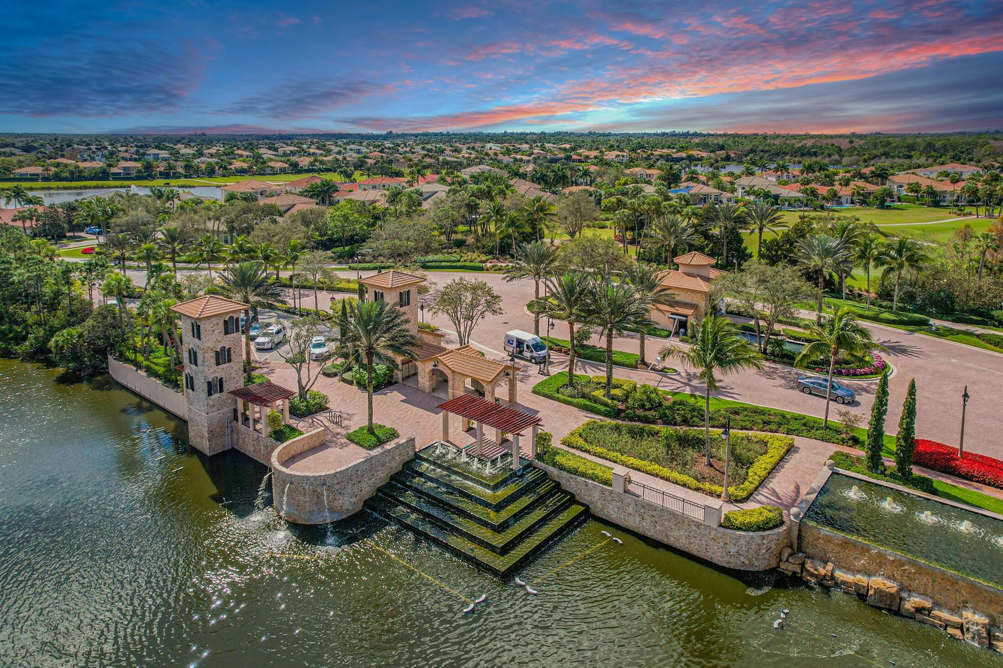 Refined Luxury & Easy Living at Jupiter Country Club. This sun-filled residence features a private elevator leading to a spacious open floor plan with soaring ceilings. The gourmet kitchen boasts a large island, ample cabinetry, and a gas 5-burner cooktop perfect for entertaining. Enjoy your serene championship golf course views via a private screened and covered balcony. Ideal for morning coffee or evening wind-downs. Live the resort lifestyle at Jupiter Country Club with fine dining, golf, tennis, pools, fitness & spa. All just walking distance from your doorstep. Plus, you are within close proximity to Jupiter's beaches and vibrant coastal living. Your new home also has a new AC, grand loft, complete impact windows & was built recently in 2016!