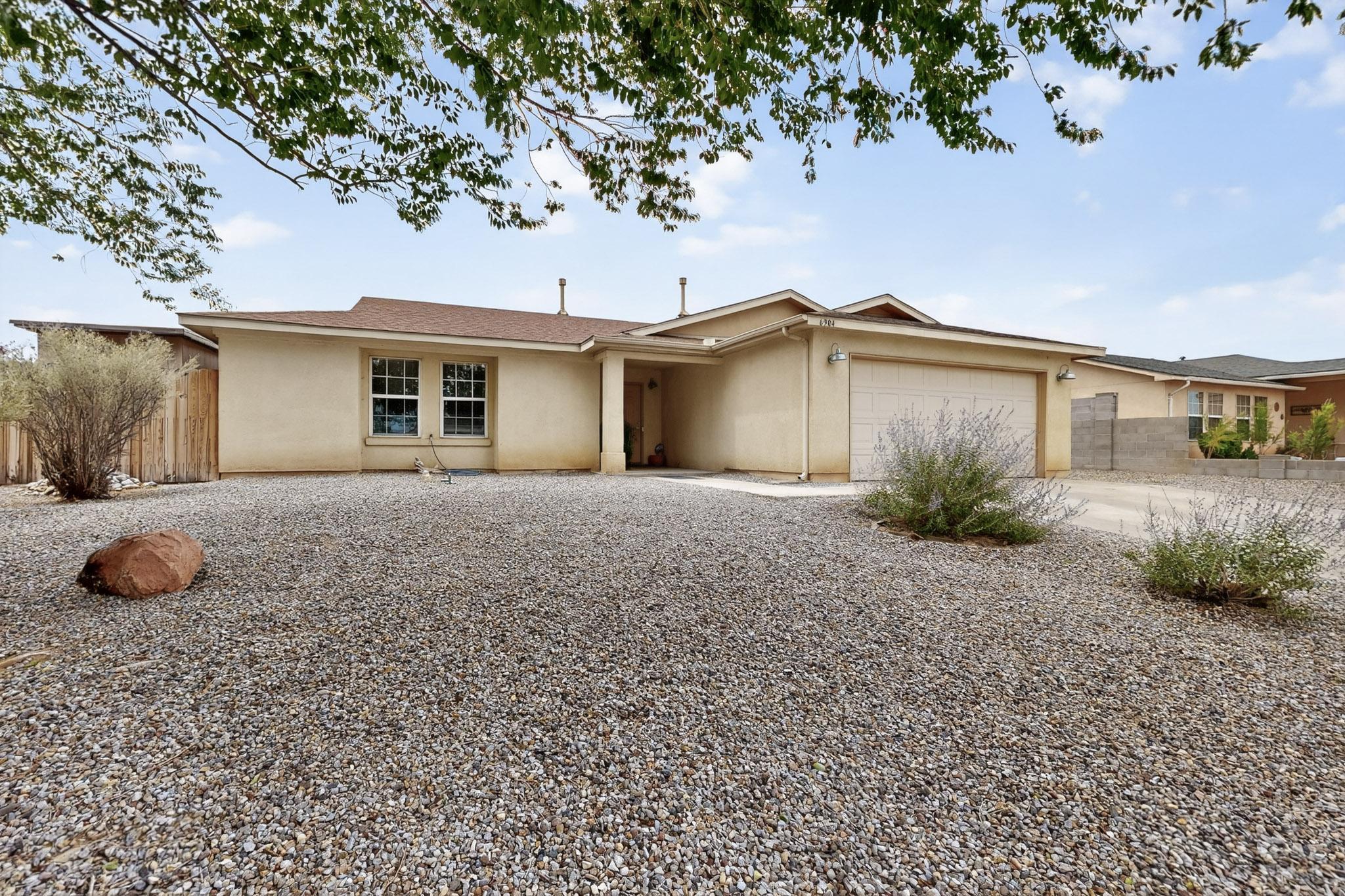 Charming 3-bedroom, 2-bath single story home in Enchanted Hills with great updates. The living room boasts high ceilings and impressive built-in shelving, creating an open, airy feel with plenty of space. Enjoy a large backyard with covered patio, walled backyard and storage shed-ideal for outdoor living and very private. Interior features include Refrigerated air, updated windows, water heater, and replaced plumbing (no poly piping). Solid home with great potential for personal touches, offering comfortable living in a convenient location near parks, schools, and shopping centers! Easy commute to Albuquerque, Bernalillo, and Santa Fe.  All alppliancecs convey, including washer and dryer.