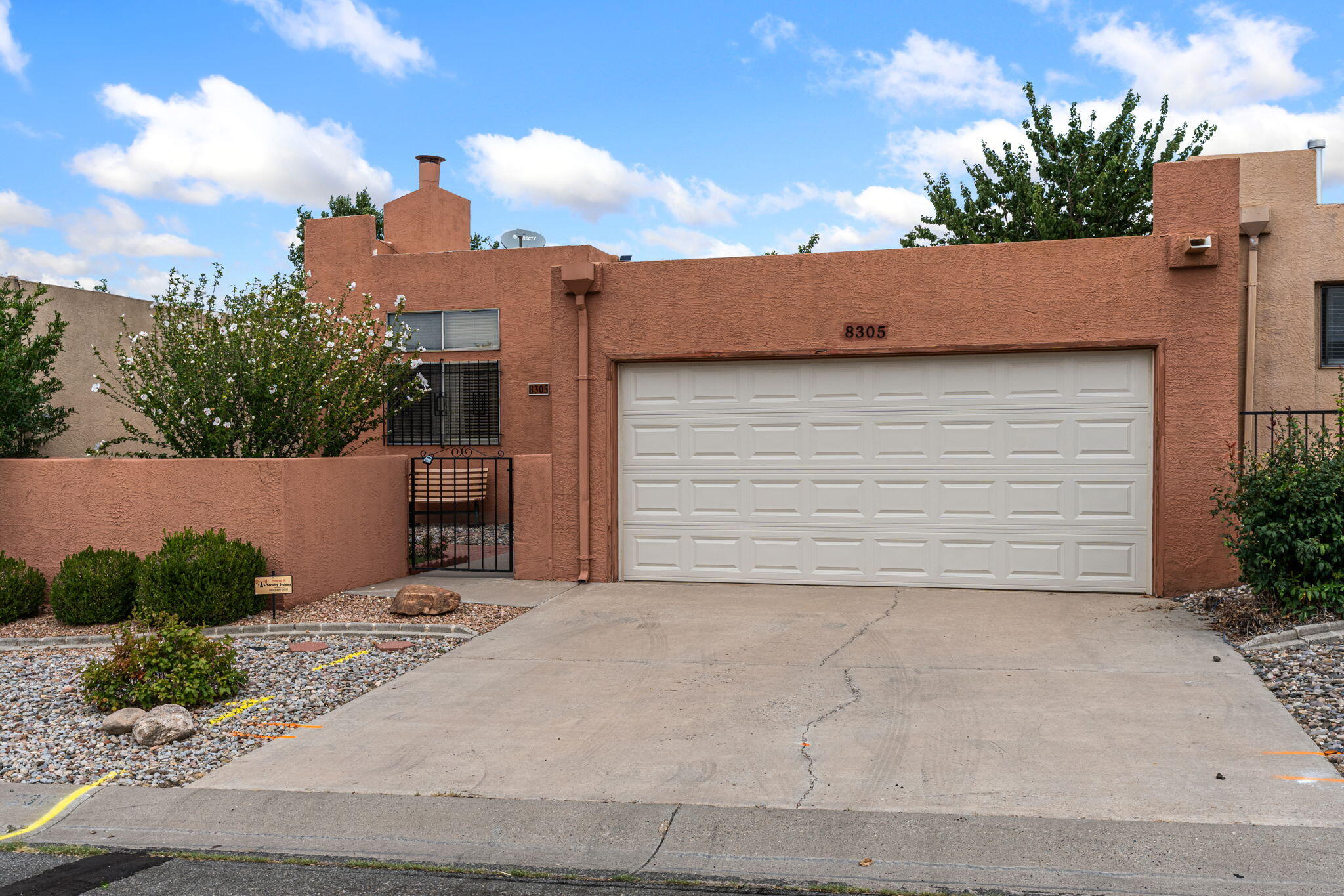 Coveted Academy North townhome in the heart of upscale neighborhood. Low maintenance curb appeal with courtyard entrance. Fresh palette & easy floorplan maximizes space! Raised ceilings & skylights create an airy feel. Water closet in en-suite bathroom. Walk-in closets.  Plenty of room for work & play! Al fresco fun in front & back with courtyards, patios, & shade trees. Room for gardening dreams - big & small. Extended 2-car garage. Secure area close to parks, N Pino Trail, fine dining, shopping, & recreation. Turn key home tucked safely away from the noise, but central to the city's best amenities, schools, and industry!