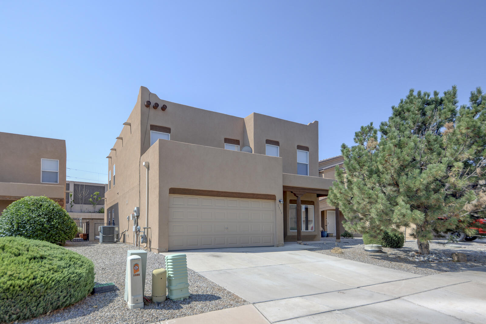 This spacious 2597 SQ FT near North Valley Home  shows like NEW. In the last few months it has been carefully updated  from stem to stern., Freshly painted from top to bottom.  New carpet, New Stainless steel appliances. New Toilets. All rooms are Generously  sized. Ample counter space in the kitchen, a pantry, and ample cabinetry.  Spacious primary bedroom downstairs with separate tub and shower, large walk-in closet and water closet. 4 large bedrooms upstairs with over-sized closets. Thermal windows and doors provide lots of natural light. Refrigerated Air. Covered patio downstairs and upstairs balcony. HOA covers front landscaping and is only $140 Quarterly. Easy care back landscaping. Near Old Town and the Bosque Trails. Easy to show.
