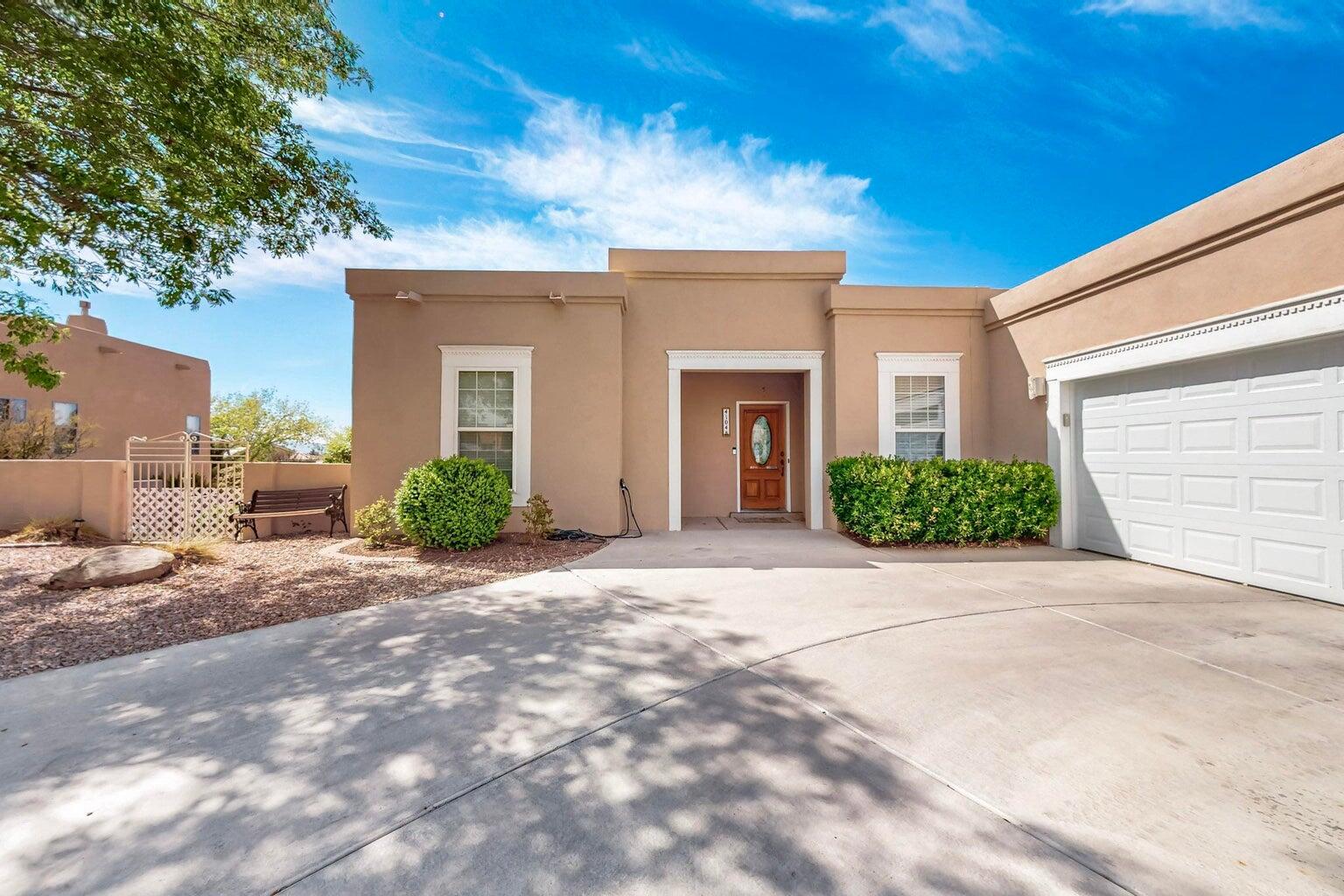 Stunning 4-bedroom custom home in 7-Bar Loop, featuring an open floor plan, gleaming laminate and tile floors, plantation shutters, Corian counters, and a sunny kitchen with garden window. The spacious great room and owner's suite open to a deck overlooking the city and  a lovely backyard with your own private pool and a putting green, to enjoy. Three bedrooms are on the main level; downstairs offers a 4th bedroom with full bath--ideal for guests--plus a large recreation/media room with wet bar. Recent updates include stucco, newer flooring downstairs, newer roof, and garage door. Nestled in a quiet neighborhood loop near shopping, dining, and trails, this home truly shines!