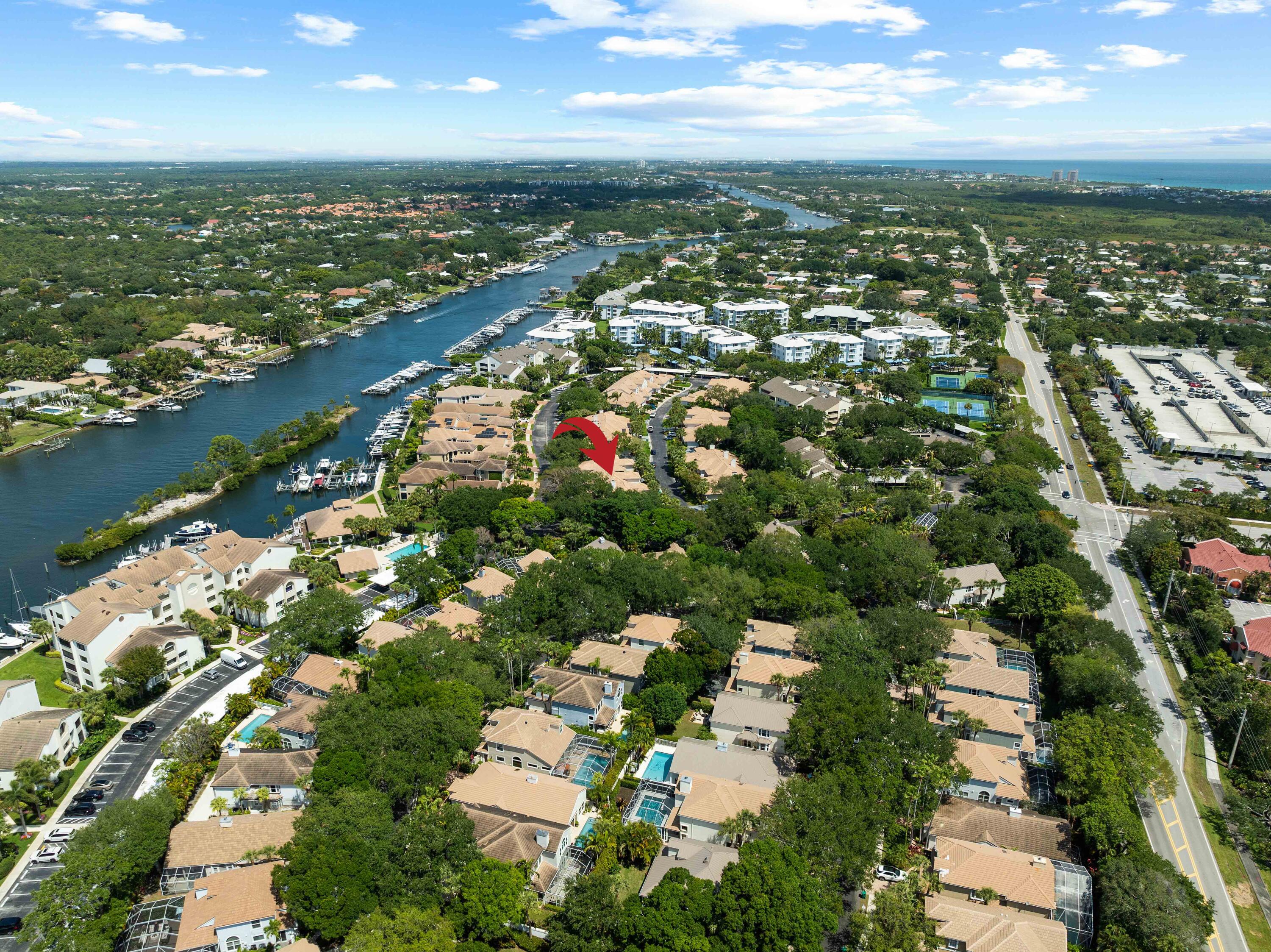 Welcome to this beautifully updated 3-bedroom, 2.5-bath townhome in the gated Intracoastal community of Oak Harbour in Juno Beach. Rarely available, this spacious residence lives like a single-family home with a 2-car garage, enclosed porch, inviting living spaces, and a private, lushly landscaped courtyard. Recent upgrades include a new roof (2022), impact glass hurricane windows and garage door, beautiful hardwood flooring throughout, and tastefully renovated bathrooms. Additional interior updates include remodeled bathrooms, fresh coastal paint throughout, redone and modernized stairs, plantation shutters, a private and spacious backyard, and a 2023 water heater. The kitchen features newer stainless steel appliances. Additional highlights include soaring ceilings, generous closet space, Hunter Douglas shades, new garage storage, and Icynene attic insulation.

Oak Harbour offers a marina, one of the community's most desirable amenities, with boat slips often available for rent or sale. Additional amenities include two pools, tennis courts, a clubhouse with fitness center overlooking the Intracoastal, and 24/7 guard gate security. Coral Cove is very pet-friendly and just minutes from Juno Beach Pier, shopping, dining, golf, and more.