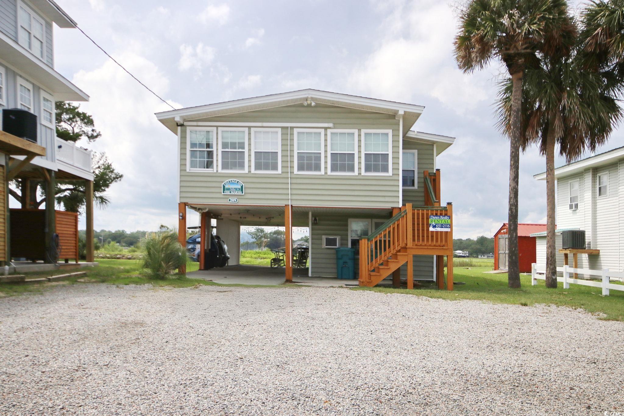 209 N Dogwood Dr. Garden City, SC 29576