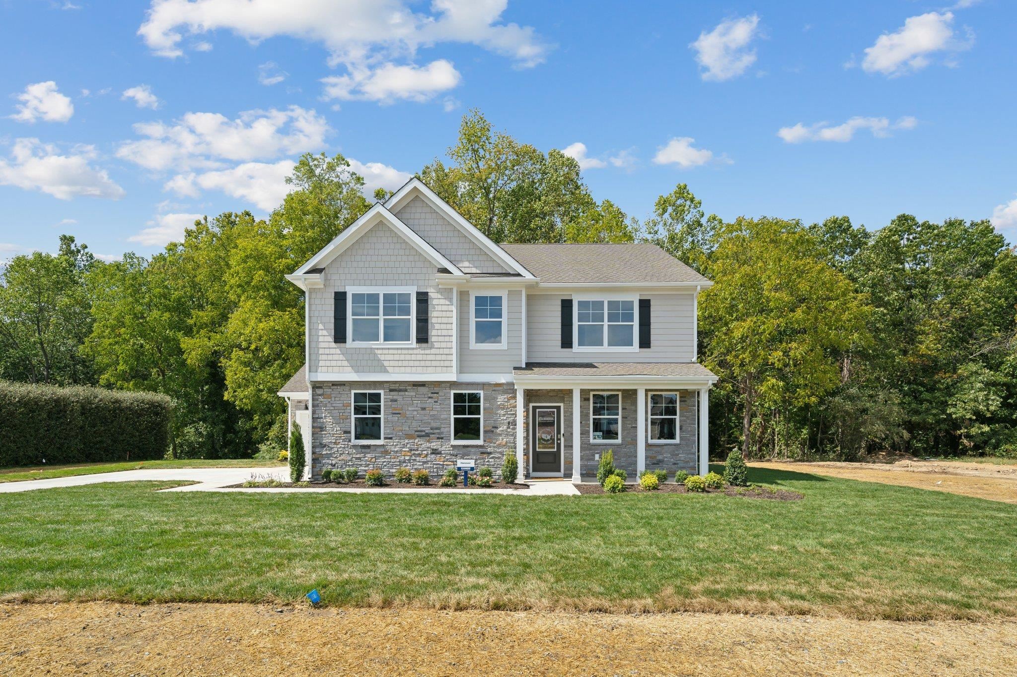 QUICK MOVE-IN! Welcome to your dream home! Set on 3.6 private acres, this Hanover model is designed with modern living in mind. The open-concept layout showcases a gourmet kitchen with a large center island, walk-in pantry, and plenty of counter space, all overlooking the bright family room and casual dining area-perfect for everyday living and entertaining. A formal dining room and private office add flexibility and elegance to the main floor.  Upstairs, a versatile loft offers space for a second family room, play area, or home office. The luxurious primary suite features a spa-inspired bath with dual vanities, a private water closet, and a walk-in closet that feels like its own room. Three additional spacious bedrooms and a convenient second-floor laundry complete the upper level.  All of this in the sought-after Green Spring Estates community - where you’ll enjoy the peace and privacy of the countryside, just a short drive to all the shopping, dining, and cultural experiences Charlottesville has to offer.