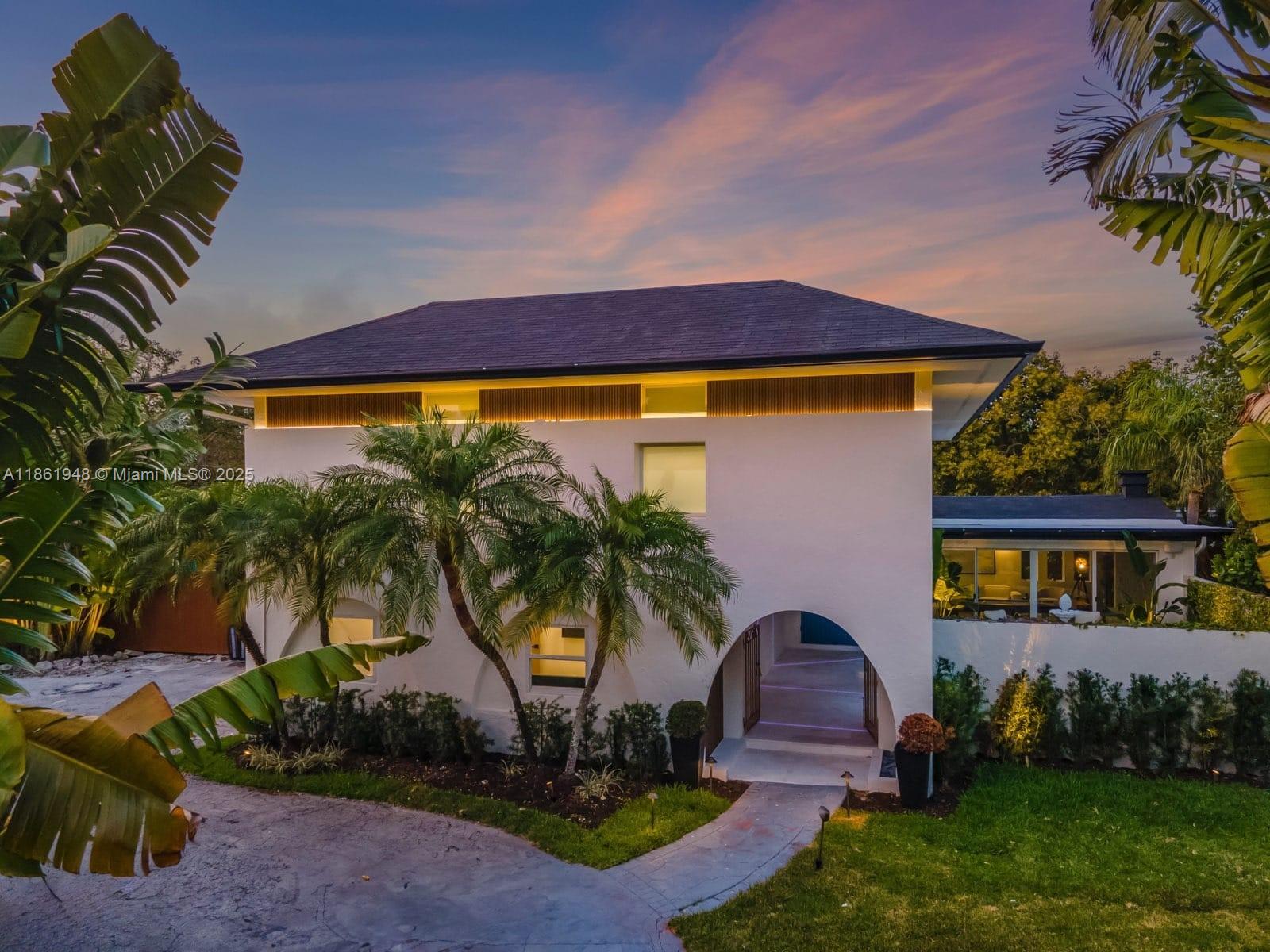 This magnificent estate spans 3,402 SQFT and sits on a lushly landscaped lot of 25,401 SQFT. Featuring 6 beds
and 4 baths, with 2 bedrooms and 2 bathrooms conveniently located downstairs. Designed with attention to detail, this home features a gourmet kitchen, a luxurious primary suite, a wine cellar, a saltwater pool, and an outdoor kitchen. Additionally, it's a smart home with cameras, impact-resistant windows, and a driveway that
accommodates up to 10 cars. The property also offers a resort-style backyard, Tesla car charging, Sonos sound system, camera security, pool chiller and heater, outdoor barrel sauna, Jacuzzi, and comes fully furnished. Situated in a non-flood zone. Near private schools, shops, restaurants, and marinas. This home is a perfect blend
of luxury and functionality.