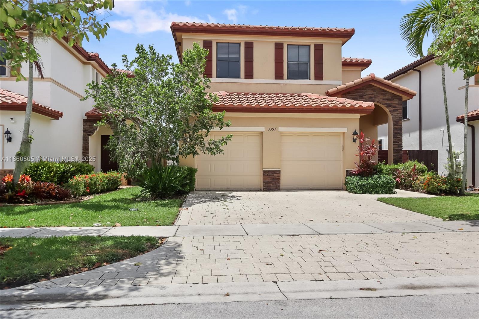 This spacious 5 bedroom, 3 bathroom home in Homestead combines modern design with everyday comfort. The thoughtful layout includes a full bedroom and bath on the first floor, perfect for guests or multigenerational living. Step outside to your private backyard featuring low-maintenance artificial turf and tranquil lake views—an ideal setting for entertaining or relaxing. Inside, the open layout flows effortlessly with no carpet throughout, creating a clean and stylish feel in every room. This home truly blends comfort, function, and lifestyle in one perfect package. Don’t wait—schedule your private showing today, this opportunity will not last!