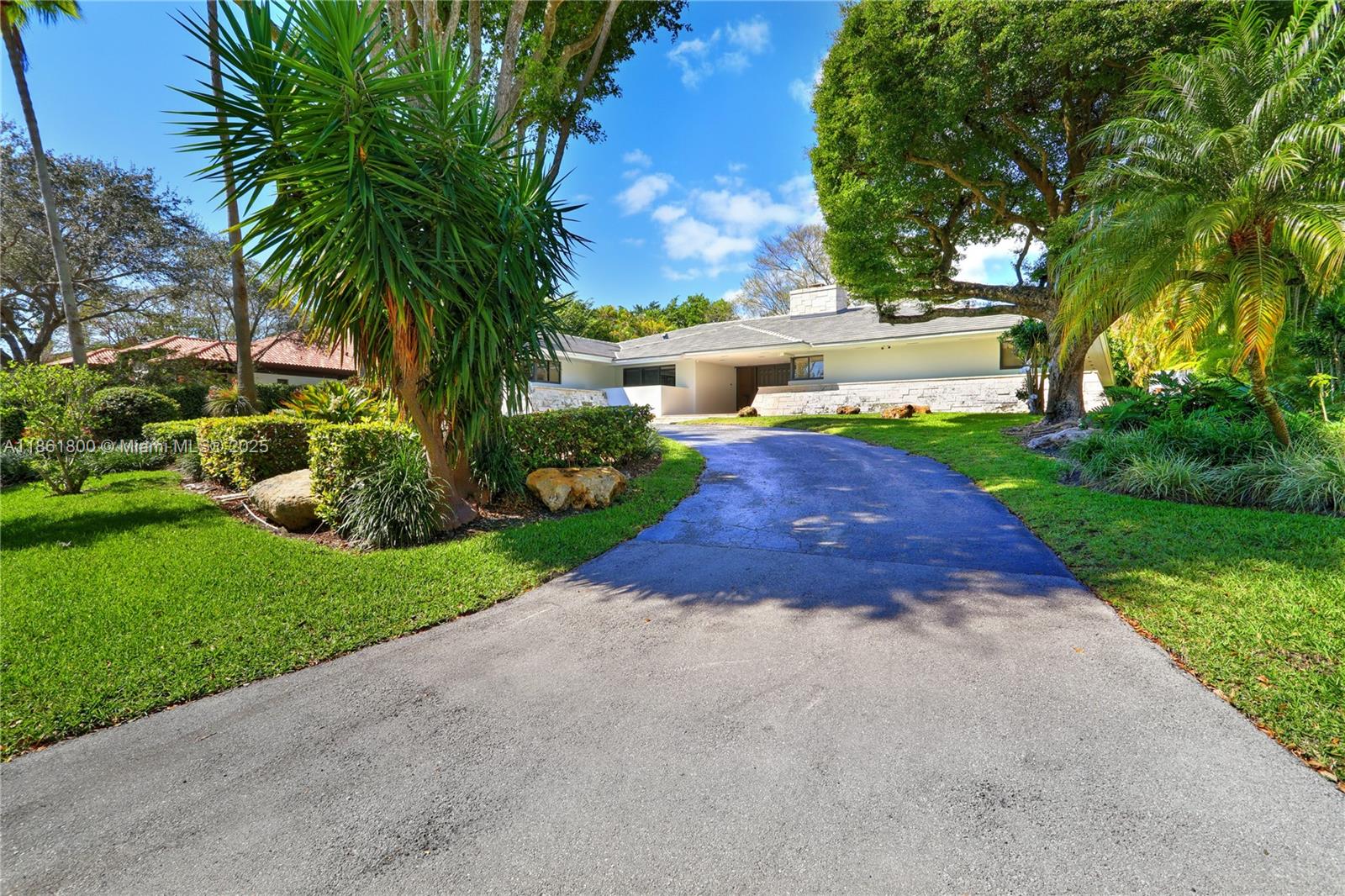 Fresh, bright, and meticulous, this executive rental in gated Cocoplum features 5 bedrooms and 4.5 bathrooms, spans 5,128 square feet, and sits on a 23,968 square foot lot. The floorplan includes a foyer entry, formal living and dining rooms, well-appointed and spacious kitchen, large family room, and a deep covered porch overlooking the pool and open patio. The primary suite includes two walk-in closets and a spacious bathroom with soaking tub, separate shower, and 2 vanities. 3 more bedrooms and 2 bathrooms are near the primary, with an additional bedroom and bathroom off of the laundry room. Located in the Sunset Elementary district with beautiful finishes throughout, this is the property for your most discerning tenant!