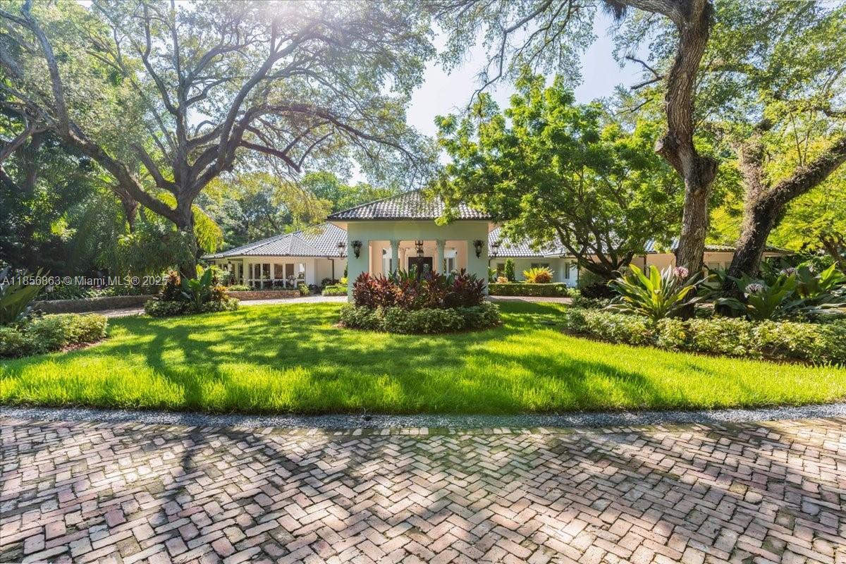 Behind the gates of Villa De Old Cutler awaits a grand one-story estate on 1.51 acres in iconic South Coral Gables! Upon entry you’re greeted with lush gardens, a sweeping Chicago brick driveway, and 8,804 sq ft of luxury living. Built for unforgettable entertaining, it boasts expansive living areas, a gourmet chef’s kitchen, and a massive family room with full wet bar that overlooks your backyard. All 6 bedrooms are ensuite, including a primary suite with its own salon, massive walk-in closets, and oversized bedroom with seating area. Outdoors, enjoy the summer kitchen under expansive covered terraces, and a resort-style pool with waterfall. Available fully furnished with flexible lease terms. This is Coral Gables Living at its finest address and location!