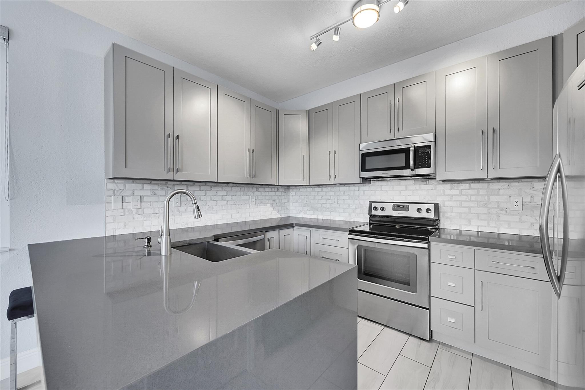 Photo 0 of home located at 150 Jacaranda Country Club Dr 200, Plantation FL