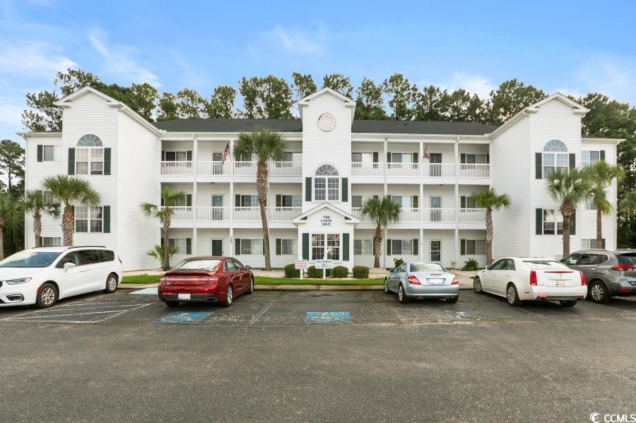 Come see this large 3 bedroom 2 bath condo! Condo is located in the golf community of Colonial Charters. Open concept living room, dining room, and kitchen. LVP installed in 2 of the bedrooms. The HVAC and the water heater were replaced in 2019. Enjoy days and nights on the updated porch to a multi-use room with LVP and windows. Enjoy the large pool right across the parking lot. Short drive to North Myrtle to enjoy restaurants, entertainment, groceries, and THE BEACH!