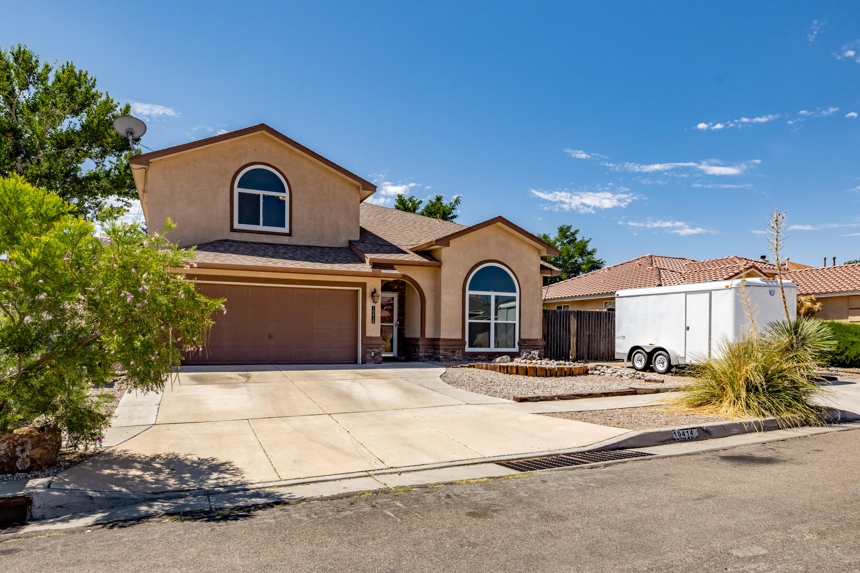 Hard to find 5 bedroom home , nestled in Paradise Meadows, close to Paradise Meadows park.  Epoxy concrete flooring, in the main living area, tile in  den & kitchen. Functional & effecient floor plan w/ lots of options for living areas.  Bedroom down, has adjoining 3/4 bath, great for guests/ 2nd primary  or office. Gourmet kitchen w/ island, SS appliances,Tile & butcher block counter tops & pantry.  Spacious primary bedroom w/ adjoining en-suite , garden tub , sep. shower, & walk in closet. Balcony from primary overlooks the expansive yard w/ fruit trees , fire pit,  water feature, & raised garden beds to the west.  RV , boat or camper   parking possible , back yard access availableFreshly painted throughout!