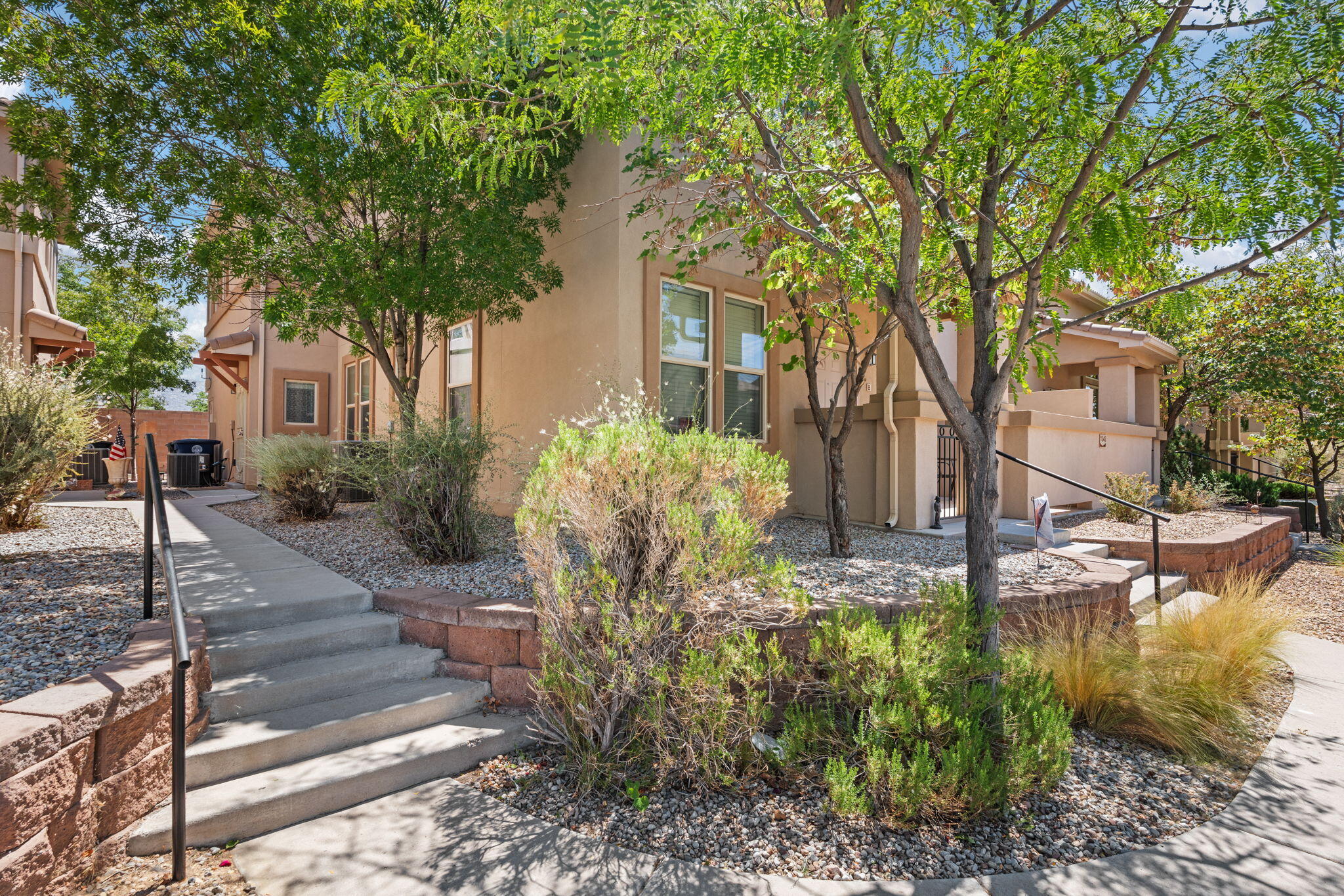 **OPEN HOUSE SAT 8/23 & SUN 8/24 11AM-1PM** Welcome to this beautifully updated 2-story condo in a desirable gated community! Step inside to find new tile flooring, fresh paint, and updated light fixtures that create a modern, move-in-ready feel. The living space opens to a private balcony with stunning views of the Sandia Mountains.Featuring 2 bedrooms, 2 bathrooms, and a 1-car garage, this home combines comfort, convenience, and style. Community amenities include a fitness center, kitchen, and an oversized clubhouse with an outdoor BBQ area perfect for entertaining.Located just minutes from the freeway, shopping, dining, and Kirtland Air Force Base, this beautiful home offers convenience, peace, and mountain views.