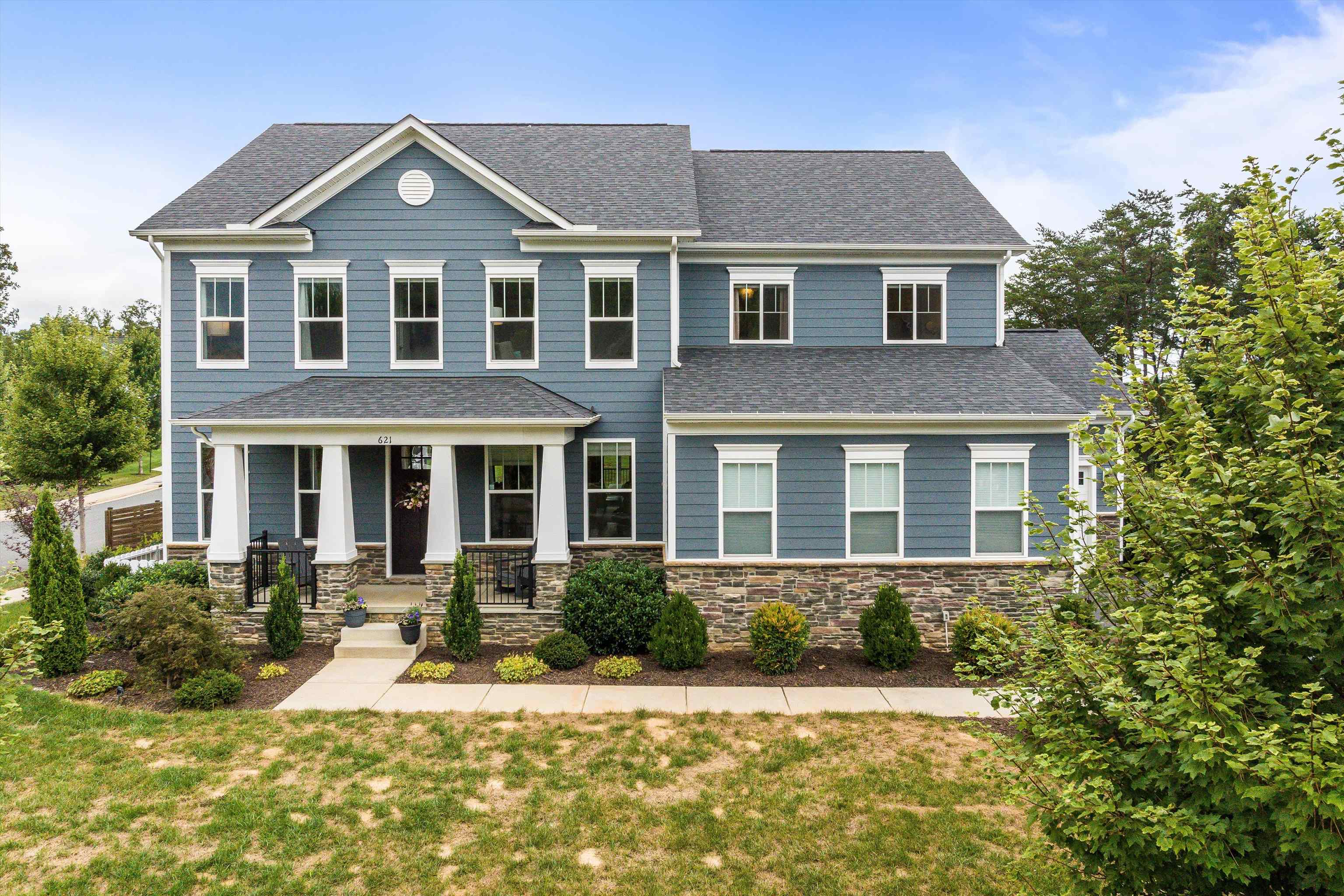Discover this stunning 5 BR, 4.5 Bth on a coveted corner lot in the highly sought-after Westlake neighborhood of Crozet. With nearly 5,000 finished sq ft, this residence combines flexible living with timeless style. The main level offers a semi-traditional layout designed for both daily life and entertaining. The great room is wide open and filled with natural light, perfect for gatherings or a busy lifestyle. The gourmet kitchen blends luxury with function, featuring an oversized island, gas range with hood, abundant cabinetry, a butler’s/entertainer’s pantry, and more. Upstairs, the owner’s suite feels like a retreat—spacious yet intimate, with a sleeping area, sitting room, walk-in closets, and a spa-like bath. Three additional BR's include one with its own ensuite and two sharing a hall bath. The terrace level has a versatile, studio-style feel, complete with a kitchenette, full bath, bedroom, and workout room, ideal for guests, recreation, or multi-generational living. Set on over a half acre, the home offers indoor and outdoor living in a neighborhood that’s close to everything; restaurants, shopping, amenities and top-rated Western Albemarle schools, with easy access to I-64 for commuting. Thoughtful design, great location!
