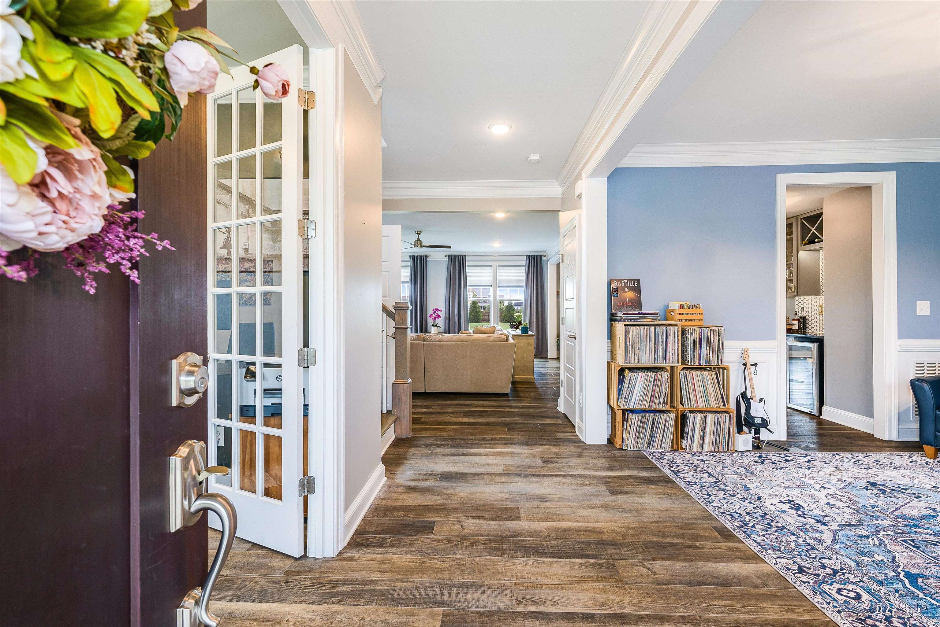 Discover this stunning 5 BR, 4.5 Bth on a coveted corner lot in the highly sought-after Westlake neighborhood of Crozet. With nearly 5,000 finished sq ft, this residence combines flexible living with timeless style. The main level offers a semi-traditional layout designed for both daily life and entertaining. The great room is wide open and filled with natural light, perfect for gatherings or a busy lifestyle. The gourmet kitchen blends luxury with function, featuring an oversized island, gas range with hood, abundant cabinetry, a butler’s/entertainer’s pantry, and more. Upstairs, the owner’s suite feels like a retreat—spacious yet intimate, with a sleeping area, sitting room, walk-in closets, and a spa-like bath. Three additional BR's include one with its own ensuite and two sharing a hall bath. The terrace level has a versatile, studio-style feel, complete with a kitchenette, full bath, bedroom, and workout room, ideal for guests, recreation, or multi-generational living. Set on over a half acre, the home offers indoor and outdoor living in a neighborhood that’s close to everything; restaurants, shopping, amenities and top-rated Western Albemarle schools, with easy access to I-64 for commuting. Thoughtful design, great location!