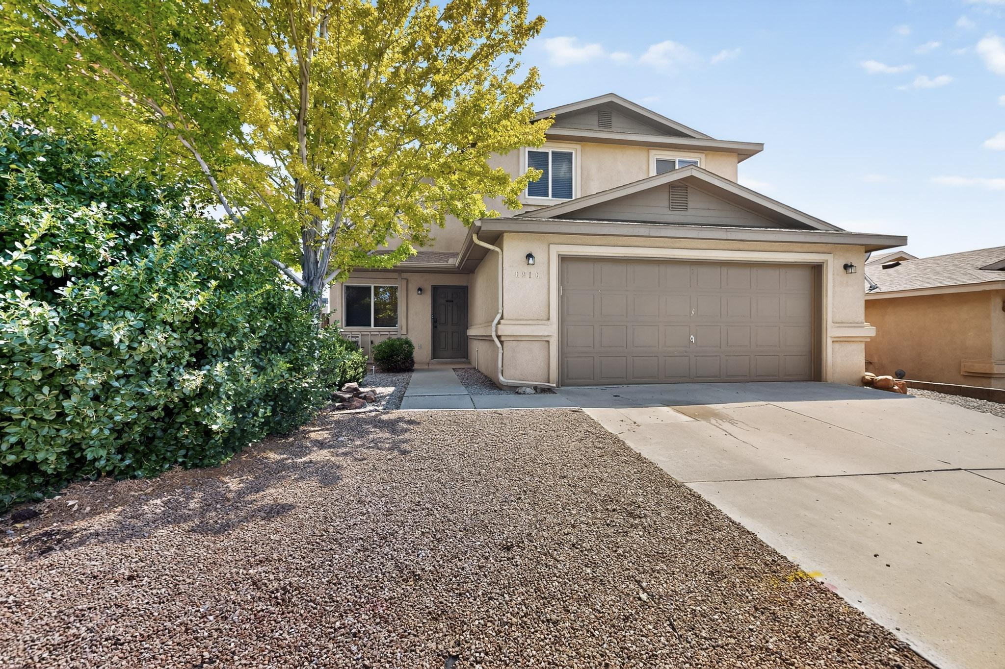 Tucked away in the sought-after La Cueva school district, this 4-bedroom, 3-bath home blends comfort with style. Soaring cathedral ceilings and oversized windows create an airy, light-filled atmosphere, while the open layout makes everyday living and entertaining effortless.The main-floor primary suite offers convenience and privacy, and the kitchen is ready for both quick weeknight meals and weekend hosting with updated appliances. Fresh light fixtures throughout add a contemporary touch.Step outside to the backyard with an in-ground garden--perfect for gatherings, unwinding after a long day, or simply enjoying the New Mexico sky. With parks, dining, and freeway access just minutes away, this home is as practical as it is inviting.