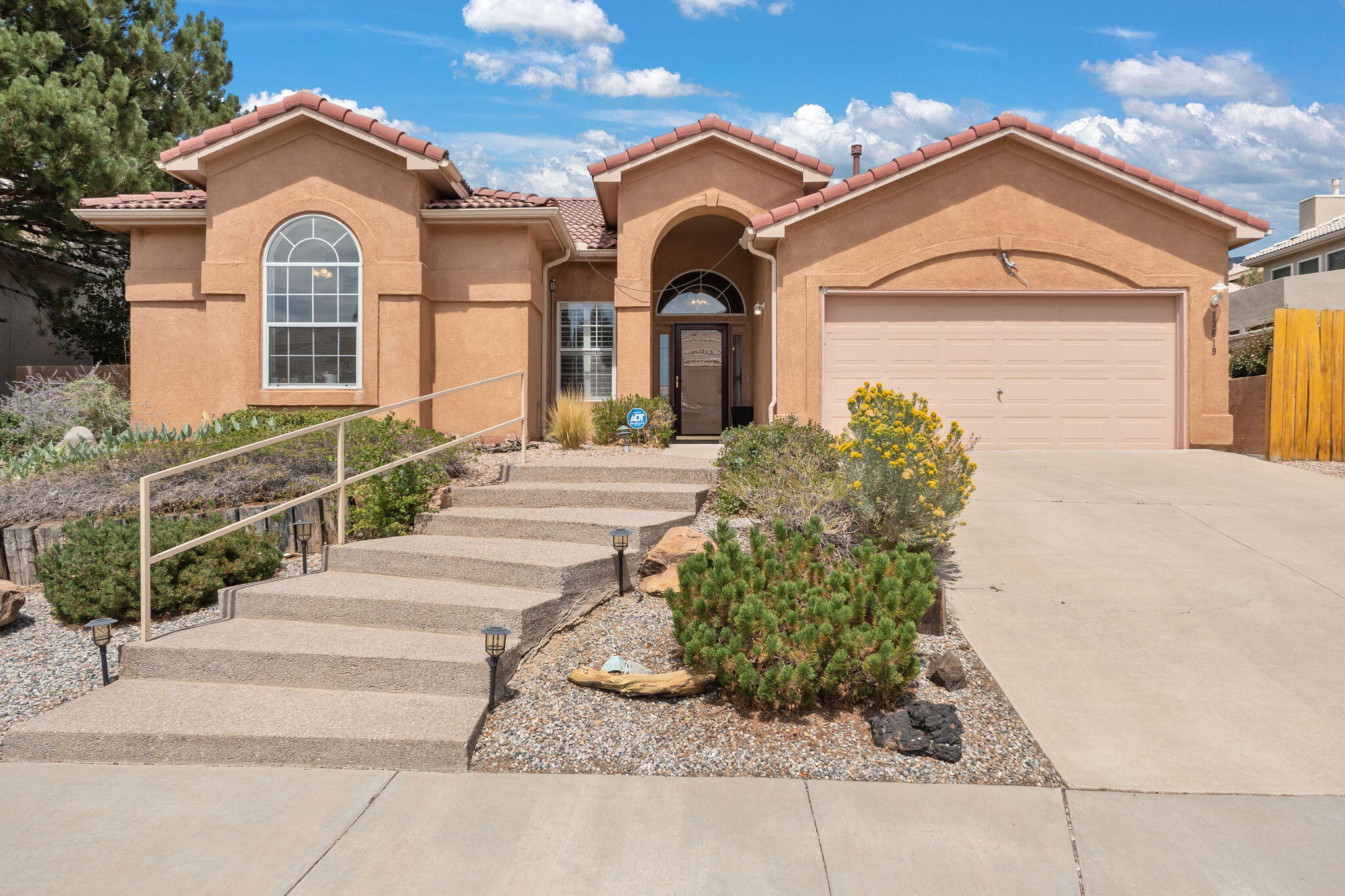 Step into this inviting 3-bedroom, 2-bath home where comfort meets style. The great room welcomes you with raised ceilings and abundant natural light, creating an airy, open feel. The spacious kitchen with open floor plan comes fully equipped with all appliances.  The primary suite offers a luxurious retreat with a jetted tub and separate shower. Recent upgrades include a 2023 HVAC system with Ecobee intelligent thermostat, plus new ceiling fans and lighting in two bedrooms. Relax on the patio with no neighbors behind--just open space perfect for birdwatching and enjoying wildlife. Nestled in the foothills, this home blends peaceful surroundings with modern comforts.
