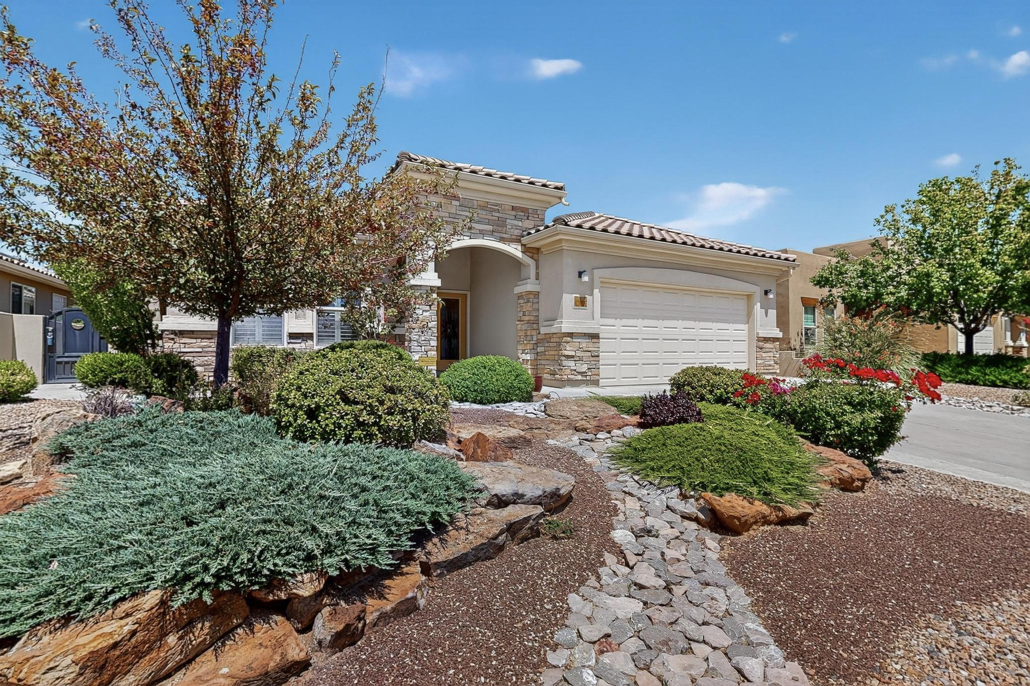 Enjoy resort-style living in this stunning home located in Alegria, a Del Webb 55+ community - clubhouse, fitness center, indoor/outdoor pools, spa, scenic trails and more!  The gourmet kitchen offers granite counters, cabinets with roll-out shelves, double oven, gas cooktop, wine rack, and premium stainless appliances. Entertain with ease in the open living areas featuring hardwood floors, surround sound, and a sunroom filled with natural light. The private owner's suite boasts a custom walk-in closet, corner soaking tub, dual sinks, and a walk-in shower. A guest suite, office, and beautifully landscaped private backyard with stucco walls, grill hookup, and power complete this perfect retreat. Washer, dryer, refrigerator, water softener/filter all convey for your convenience.