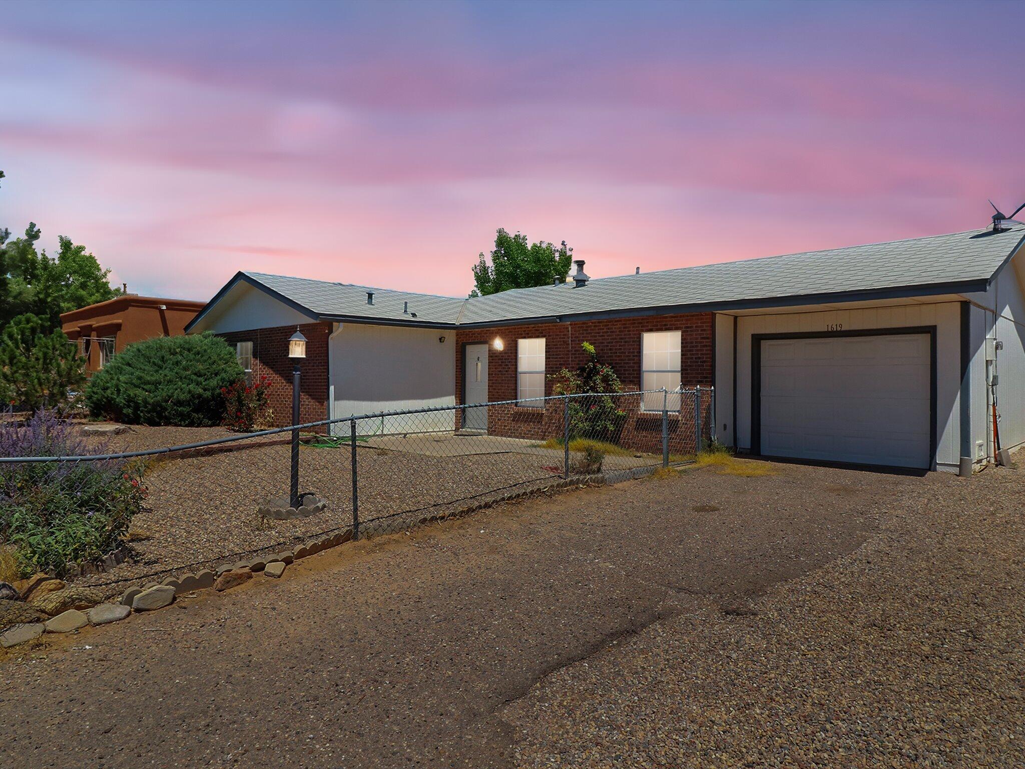 Welcome home to this spacious 3 bedroom, 2 Bath home located in the Star Heights neighborhood of Rio Rancho. Enjoy a large backyard with mature trees and the added bonus of being adjacent to a community recreation center featuring basketball courts, a playground, and open grassy areas. Inside, you'll find tiled flooring in the dining room and wet areas, a large living room perfect for gatherings, and ceiling fans in every bedroom for year-round comfort. The master suite includes its own private full bathroom, while a single-car garage provides extra storage and parking. If you've been looking for a home that combines value, space, and location, this one is ready to welcome you!