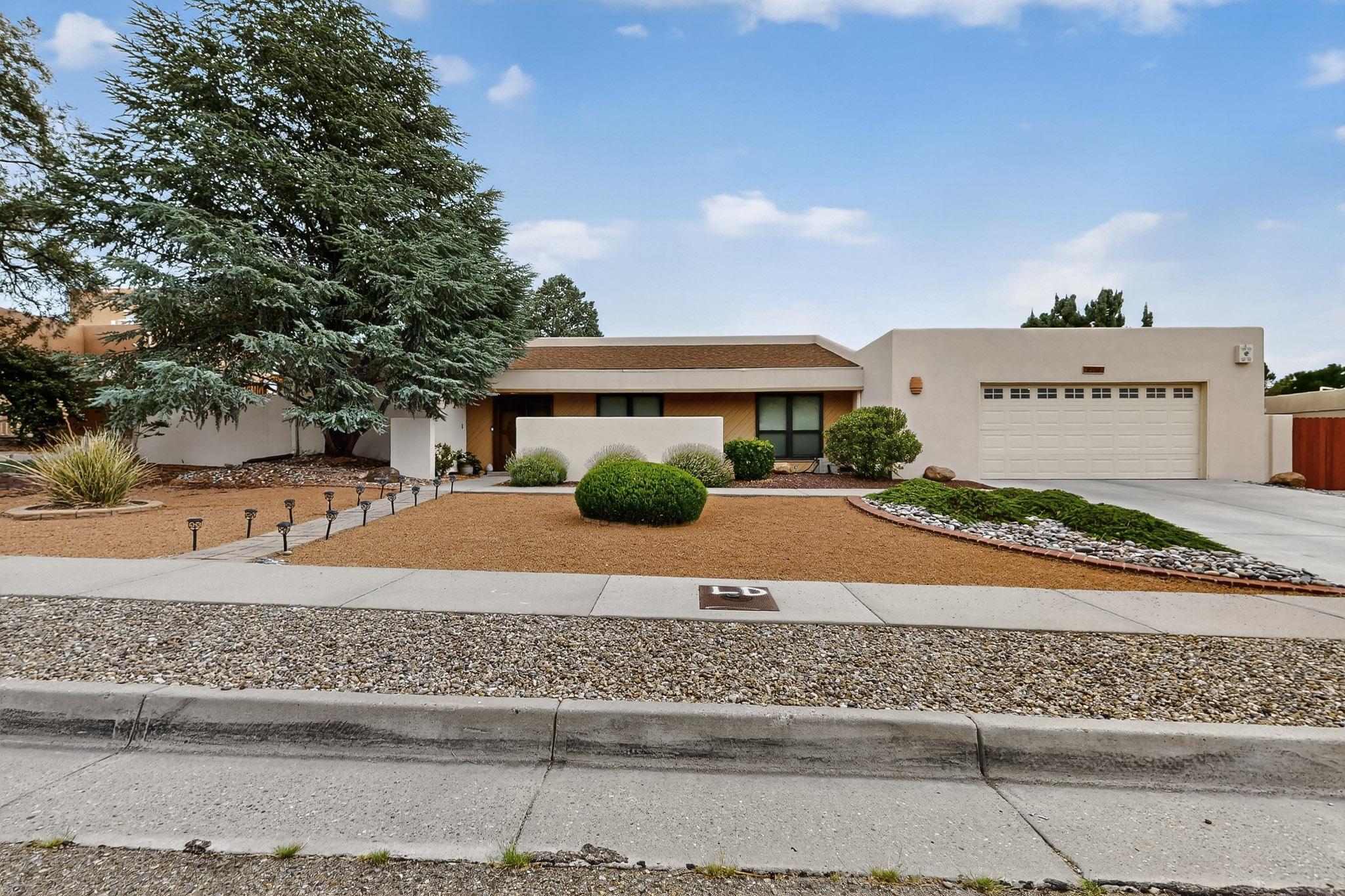 Such a nice place to come home to! Gracious, roomy home on a peaceful street in the beautiful Academy  Estates East neighborhood. a perfect Northeast Heights location! Centrally located near shopping, restaurants, parks, and biking/walking trails, but the right distance from the noise of major streets. Relax and entertain by the  sparkling pool in the huge, low maintenance backyard, or enjoy a quiet conversation in the large gazebo. Primary suite and large secondary bedrooms are at opposite ends of the home for privacy and quiet. Two large living areas and a stone fireplace add to the quiet enjoyment and entertainment possibilities. Come see this beautiful, comfortable home!
