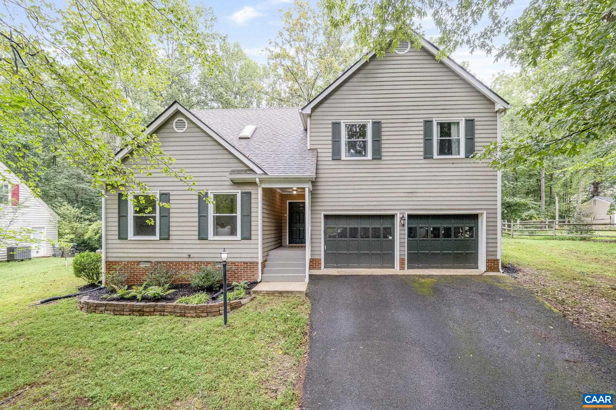 OPEN HOUSE-Sunday 8/24 from 12-2pm. Imagine arriving at your future home, nestled amid the wooded serenity of Forest Lakes—a community where early morning light dances through trees, kids pedal to pools, and neighbors greet one another in the pavilion. Inside, soaring vaulted ceilings frame the Great Room, bathed in natural light, where living, dining, and kitchen spaces blend for quiet mornings or gatherings. Step into the family room and let your eyes follow the sunlight through expansive windows out onto a deck overlooking a private, fenced backyard, complete with a stone patio. Upstairs is a sanctuary: the primary suite, tucked away in quiet comfort, features a spa-style bath and custom built-in closet inviting organization and peace. Two additional bedrooms share a well-appointed full bathroom, while the second-floor laundry and ample storage ease daily routines. This home isn’t just walls and rooms—it’s where evening strolls lead to lakeside reflections, spring farmer’s markets bring people together, and your driveway is a front-row seat to childhood memories. Living here means easy access to Charlottesville’s shopping, dining, NGIC, UVA, and the airport—all just minutes away.