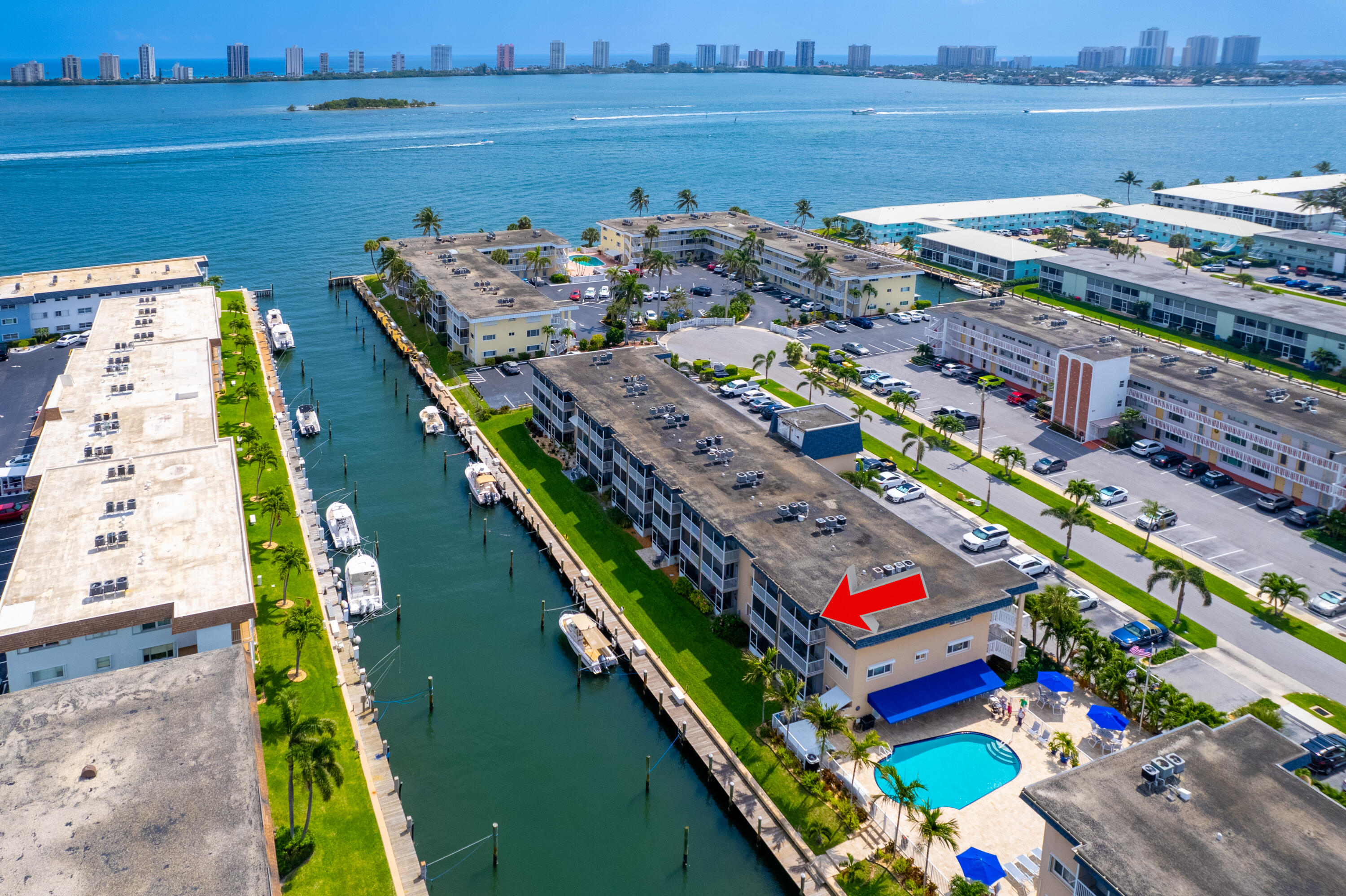 YOUR BOATERS PARADISE AWAITS for UNDER $200K!! This rare waterfront 2BR/2BA, 3rd floor end unit is a hidden gem in the active, 55+ waterfront boating community in North Palm Beach. If you own a boat or desire one, upon availability once an owner, you may lease a slip for only $1.50 per foot!! Features include; complete hurricane impact glass, fresh paint, 2017 AC, 2009 electrical panel, 2024 LG refrigerator, 2025 dishwasher & 2008 stove, 2018 water heater, Whirlpool microwave and ceramic tile flooring throughout. to You will enjoy the breathtaking morning sunrises and evening skyline views of Singer Island off your private balcony or poolside. In addition, you may rent unit after 2 years of ownership. You will LOVE the beautiful intracoastal breezes off your master bedroom screened in balcony. Enjoy grilling out by the pool with friends and family while watching the boats go by on the intracoastal waterway. You are minutes away to North Palm Beach Golf and Country Club, 5-star restaurants, shopping, beautiful beaches, the new Brightline train and only 15 minutes to Palm Beach International airport!