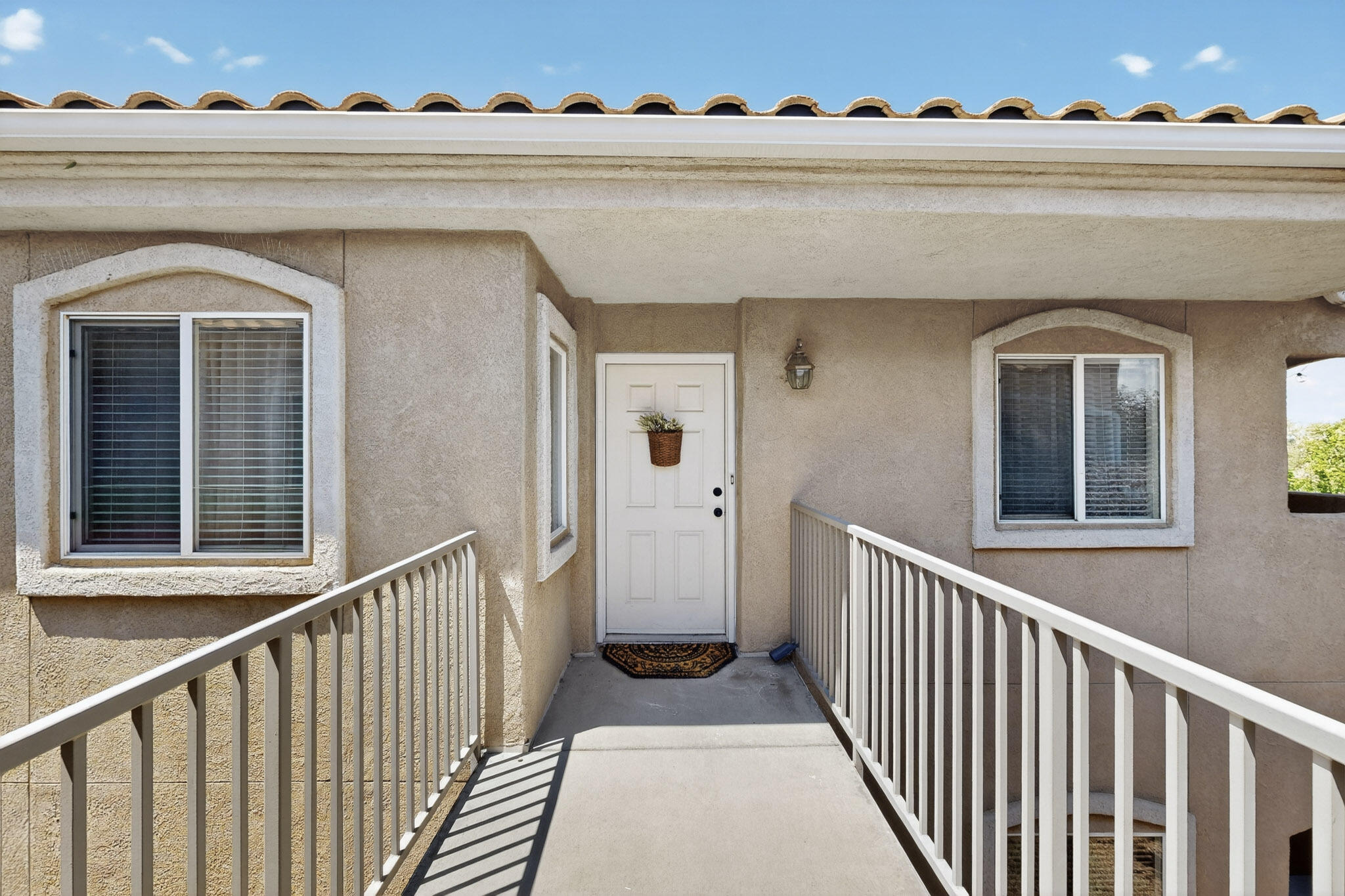 Welcome to beautiful Rancho Mirage Community. This 2 bedroom 2 bath, 1 car garage, condo is located in this beautifully landscaped gated community. This updated home offers a modern chic feel. The kitchen offers stainless steel appliances. Updated, bathrooms, service room and fixtures along with refrigerated air conditioning plus a newer water heater. Community amenities feature two pools, a clubhouse, fitness center, parks, playgrounds, walking and biking trails offering scenic views. With easy access to I-25 and Paseo del Norte. HOA covering exterior maintenance and grounds. Don't miss this opportunity it won't last long!