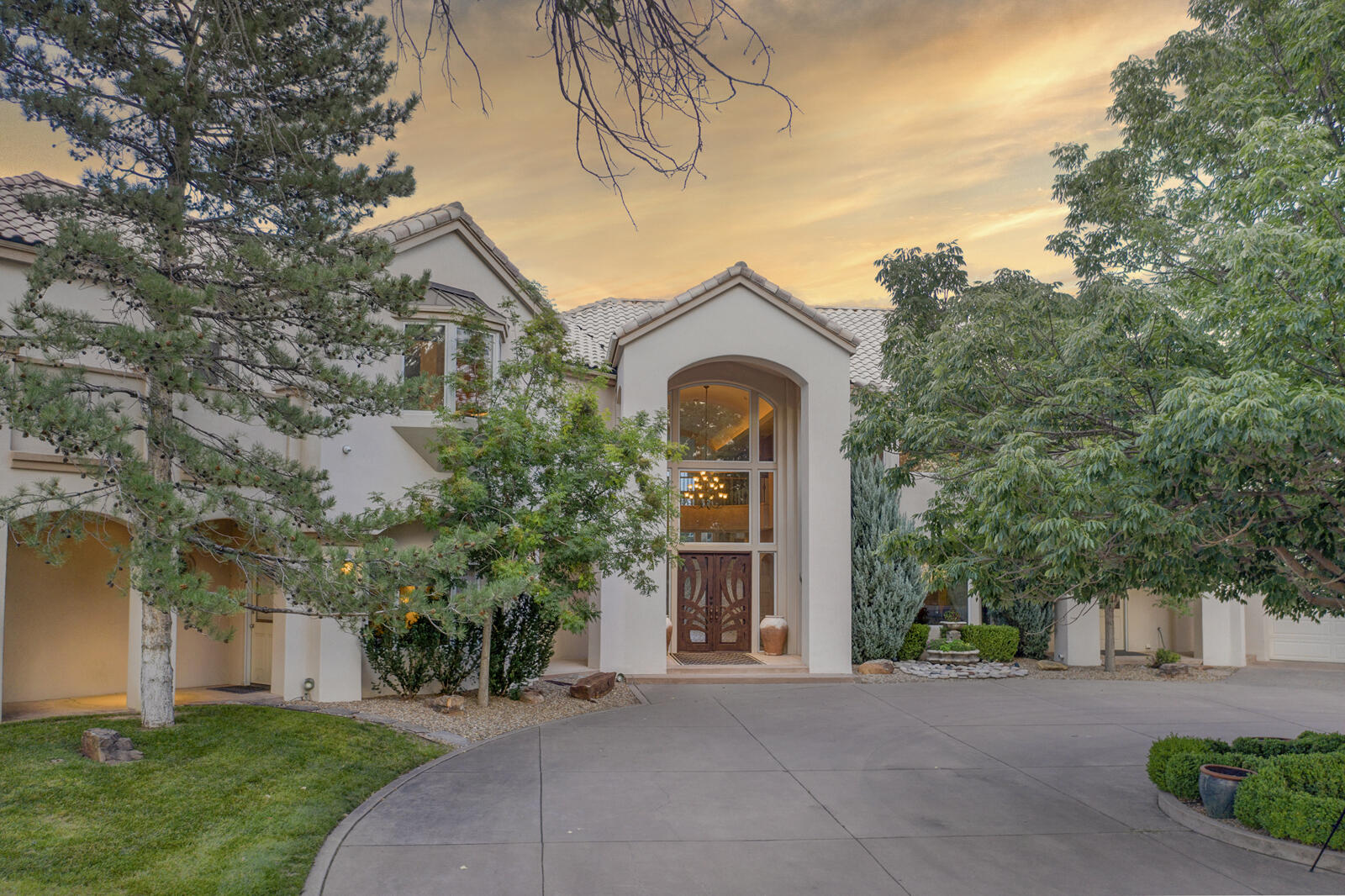 Luxury, Resort Living at it's Best Offering Privacy and Tranquility. This Stunning Home Sits on 4 Magnificient Lots in NAA (2 Lots Undeveloped) with Majestic Mtn Views and Ample Space for Family and Guests. The Grand Entrance Greets you with Beautiful, Custom Doors & Wide open Spaces.  Gourmet, Chefs Kitchen Features Custom Cabinets and Huge Island, Great For Entertaining and Enjoy the Private Primary with Adjacent Office. Outdoor Living is Equally Fantastic with Serene Patio surrounded by Beautiful Landscaping, a Peaceful Fish Pond on Your way to the Saltwater Pool & Pool House, Tennis Court and Soccor Field. The Gated Entry Enhances Exclusivity and Security. This Home Represents a Unique Opportunity. It's More than Just a Home, It's a Lifestyle in a Prime Location
