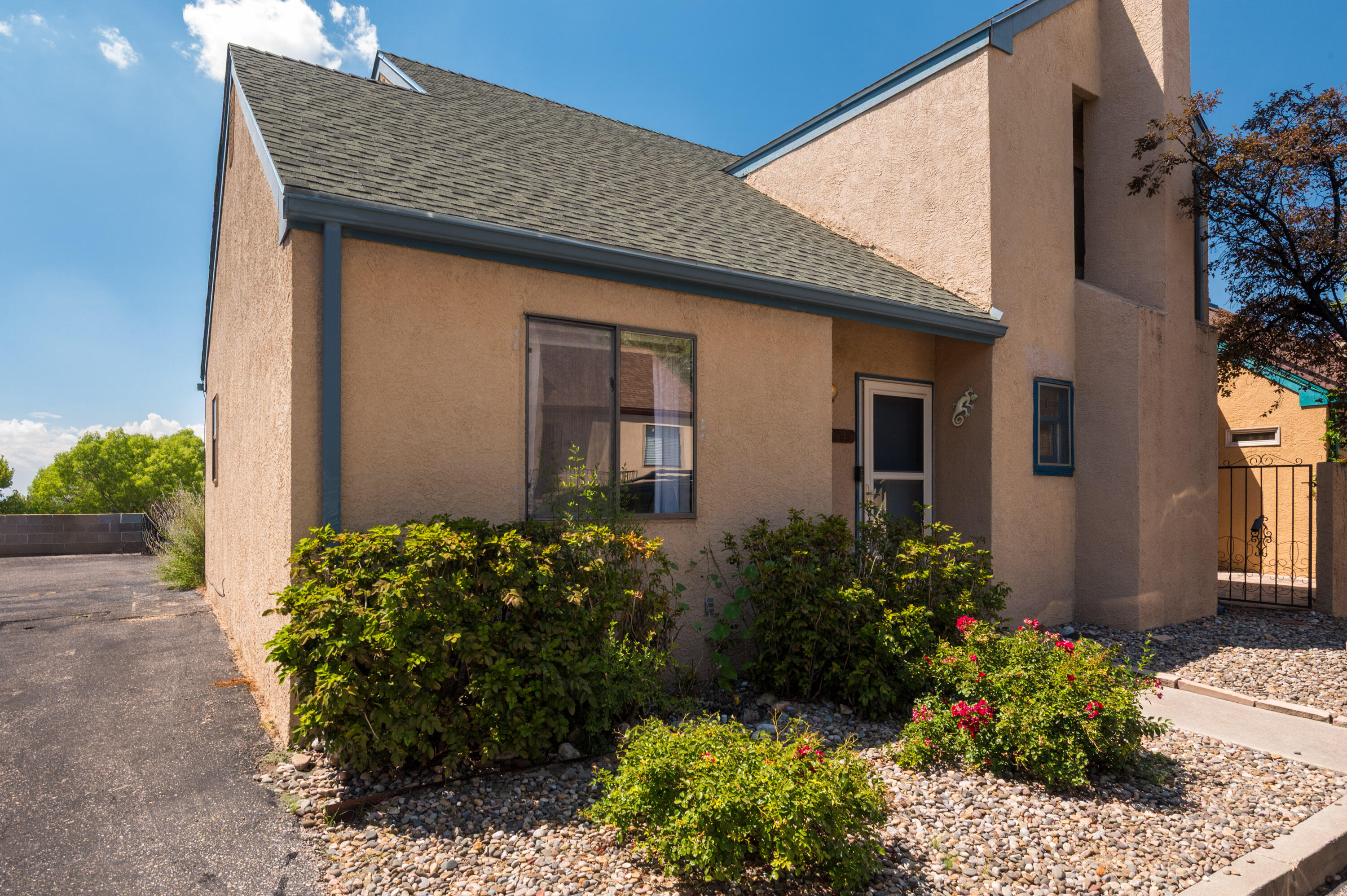 Roomy 3 BR home located in a quaint country cottage Eastridge Court neighborhood. Primary bathroom was recently renovated. New TPO roof over garage done last year and pitched shingle roof was replaced in 2021. HOA takes care of front landscaping.  2 Car Garage is tucked behind the house with parking also directly in front of the house. Owners' Suite located downstairs. Nice little patio space. Homes comes with all appliances and washer and dryer!