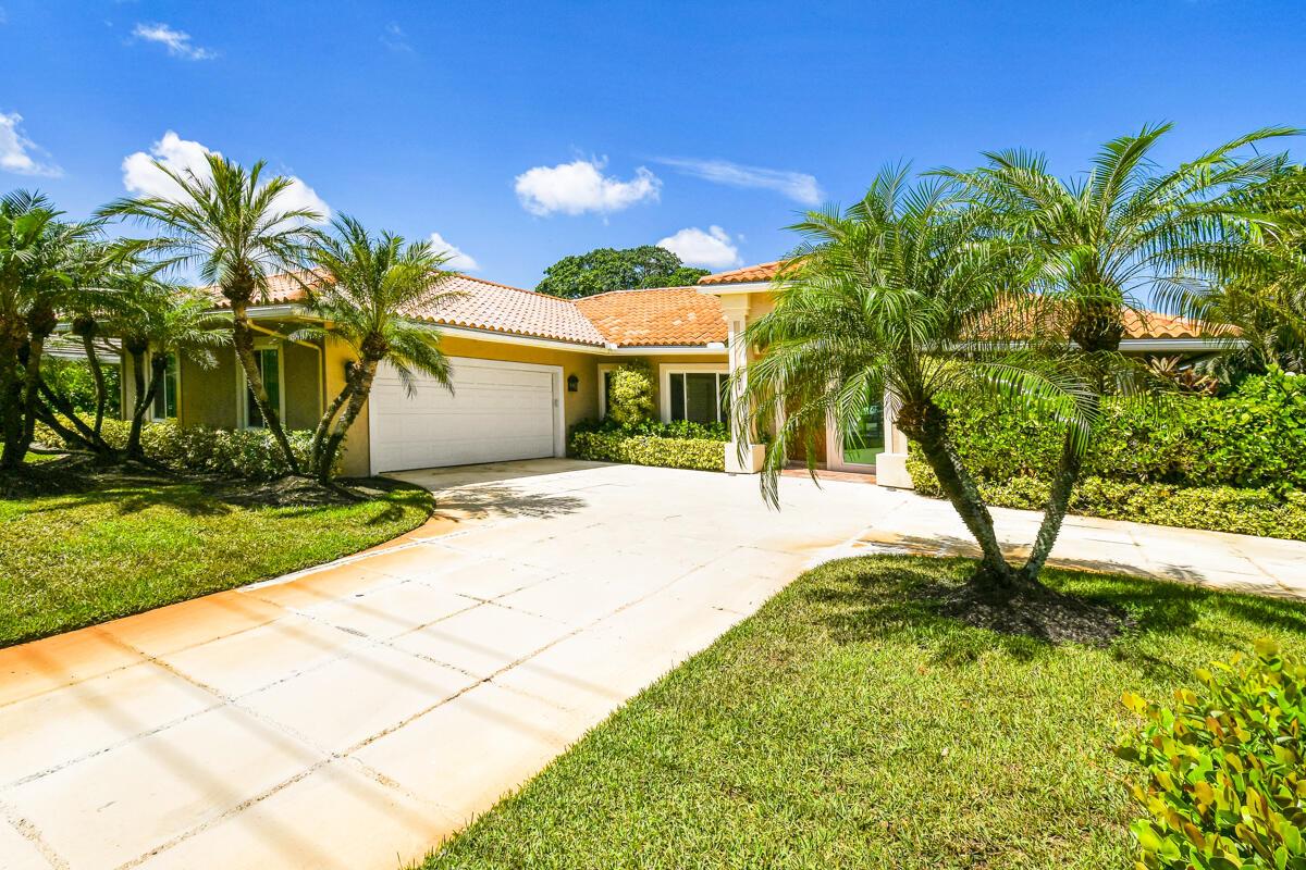 Elegance & comfort can be found throughout this well designed pool home with panoramic golf course & water views situated on a scenic lot in the Tequesta Country Club. Some of the highlights of  3/2.5 beauty are a bright & sunny master suite complete with oversized walk in closet, luxurious bathroom with whirlpool tub, a versatile office/den, a desirable split plan for privacy & functionality plus an open kitchen with center isle, ample cabinetry & granite counters.  Additional features include high ceilings,  impact-rated windows, accordion shutters breakfast area, a spacious 2 car garage. The large screen enclosure includes a sparkling heated pool, a covered lanai and amazing golf course & lake views. Tequesta CC residents also have access to  a dock & ramp on the Loxahatchee River.