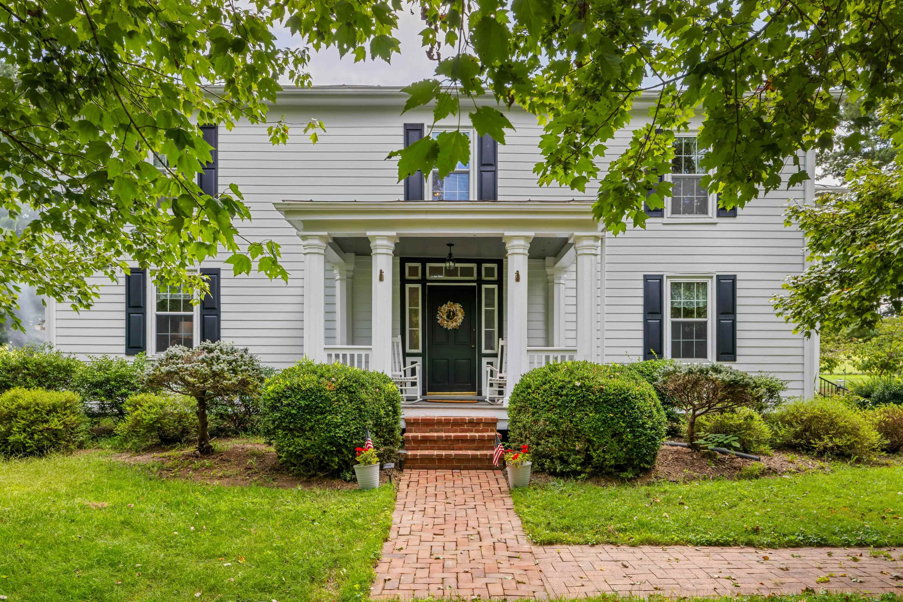 This incredible listing offers a main residence boasting over 4,000 sq ft of living space, with 5 bedrooms and 4.5 bathrooms, designed for both everyday living and entertaining.  A newly renovated kitchen blends rustic character with modern function along with a new primary bedroom and bath. Many improvements have been made to modernize and build the character of this beautiful home.  A 1 bedroom cottage on the property provides guest retreat or rental opportunity.  With acres of open land, outbuildings and views, you have have your dream estate located here.