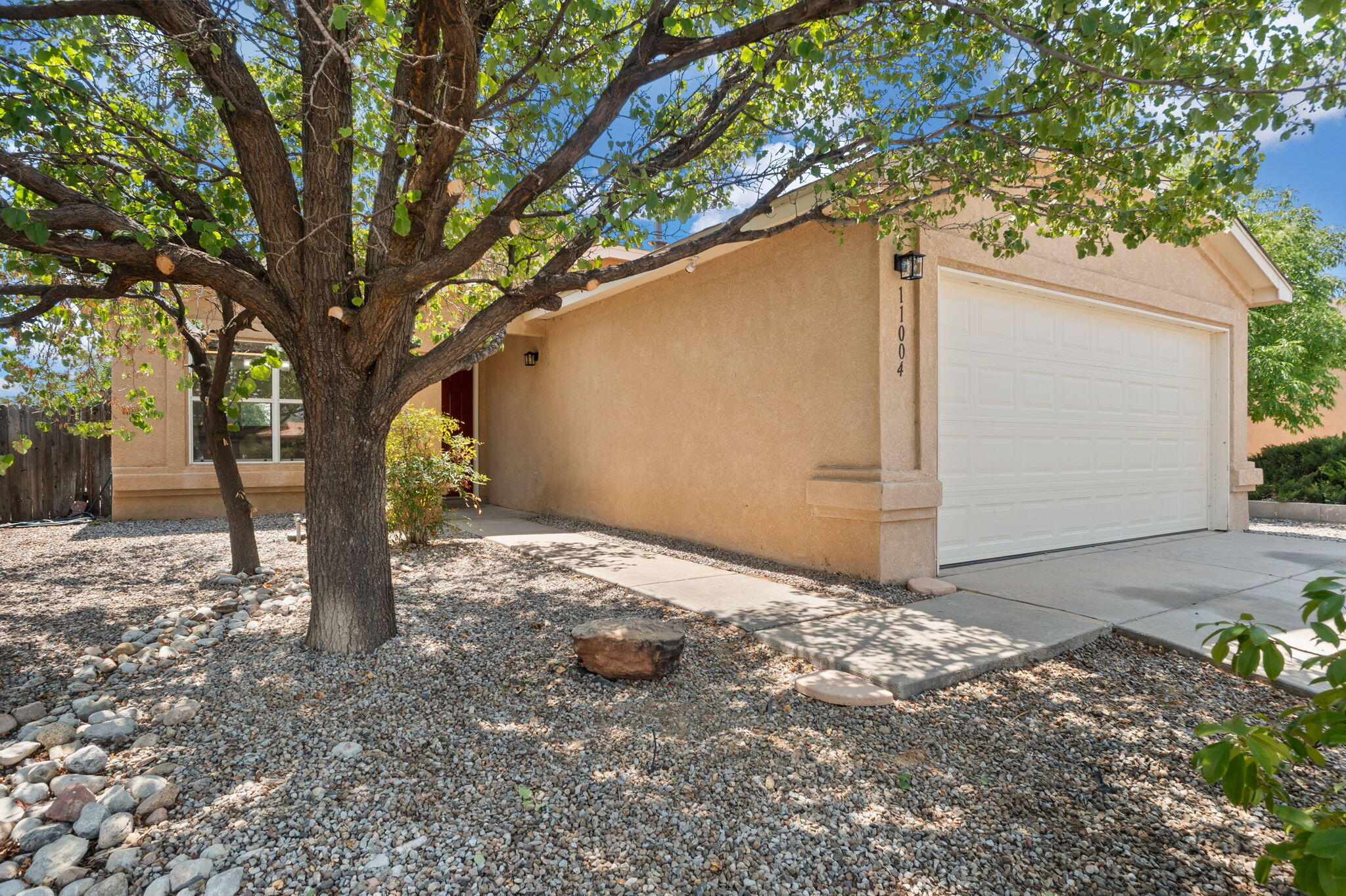 Seller offering 4.99% financing (see terms & conditions)! Stop scrolling you found the one! This newly refreshed and sparkling clean 3 bedroom, 2 bathroom home features fresh paint, all new flooring, new light fixtures, and MORE! Chef's kitchen has all new stainless steel appliances, gas range, microwave, pantry, and huge counter tops. Spacious living area with vaulted ceilings is perfect for entertaining, relaxing and more. Best of all - NO HOA fees or drama! With its inviting design and move-in ready condition, this home has everything you've been searching for. Reach out to the 450-HOME Team TODAY, because opportunities like this don't last long--schedule your showing today and make it yours before it's gone!