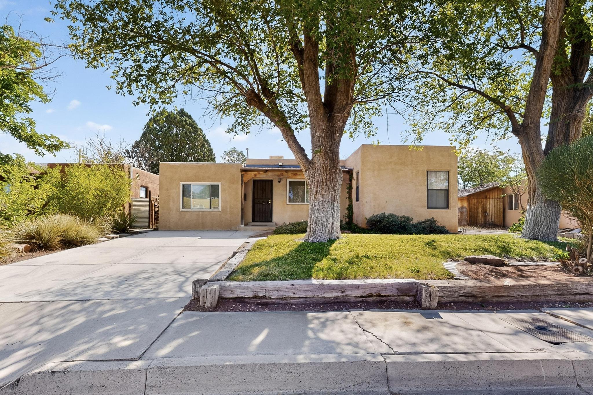 UNM North Campus Prime Location. Just minutes to UNM Law School & UNM Medical School. Right down the street is UNM South Golf Course. Close to Whole Foods, dining, walking/biking paths & parks. Easy freeway access. This 3 bedrooms w/office or possibly 4th bedroom has a large storage shed, covered patio and storage closet in backyard. The front yard has a covered patio, nice landscaping with grass and large trees. The TPO Roof was new in 2023.