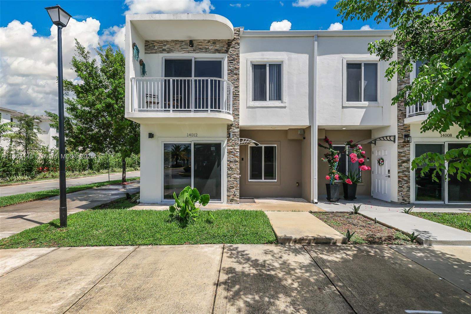 Move-in ready townhouse in the heart of Homestead! Built in 2020, this spacious 4-bedroom, 3.5-bath home features a modern open layout with bedrooms conveniently located on both floors, custom closets, and designer blinds. Enjoy the security of impact windows and doors, upgraded finishes, and a bright kitchen with island seating. Low HOA fee and a great location near shopping, dining, schools, and major highways. Perfect for families or investors—this home is priced to sell and will not last!