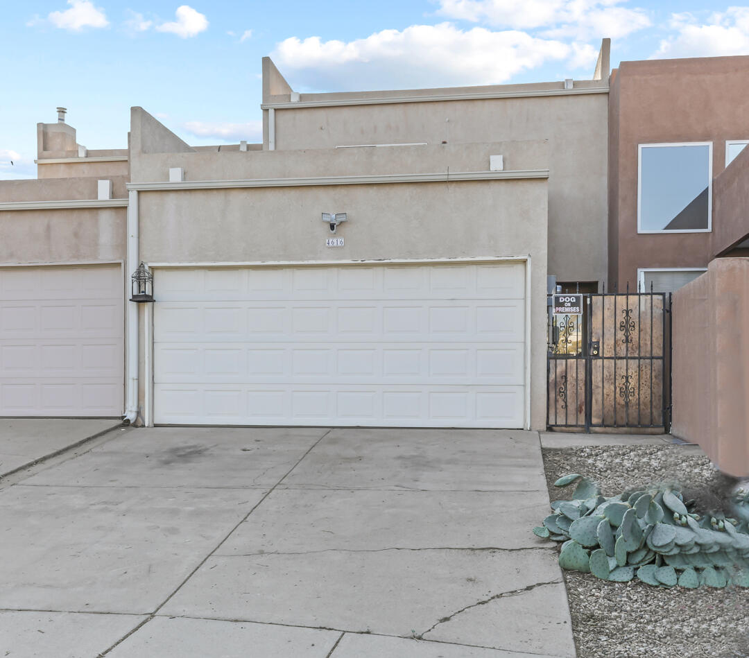 Cutie Pie in the NE Heights near CNM campus and on Morris.  Just around the corner from El Oso Grande Park and walking trails.  Perfect starter home await at the end of this cul de sac. This lovely townhome has laminate flooring, cozy gas fireplace and private courtyard entry. Large primary bedroom with walk in closet. Secondary bedroom upstairs has it's own balcony over looking the nice size backyard with garden. Downstairs bedroom next to a 1/2 bathroom. All appliances stay. For all you foodies out there, this property is close proximity to Dions Pizza, Walmart Neighborhood Market and Great Harvest Bread, to name a few. Yum!