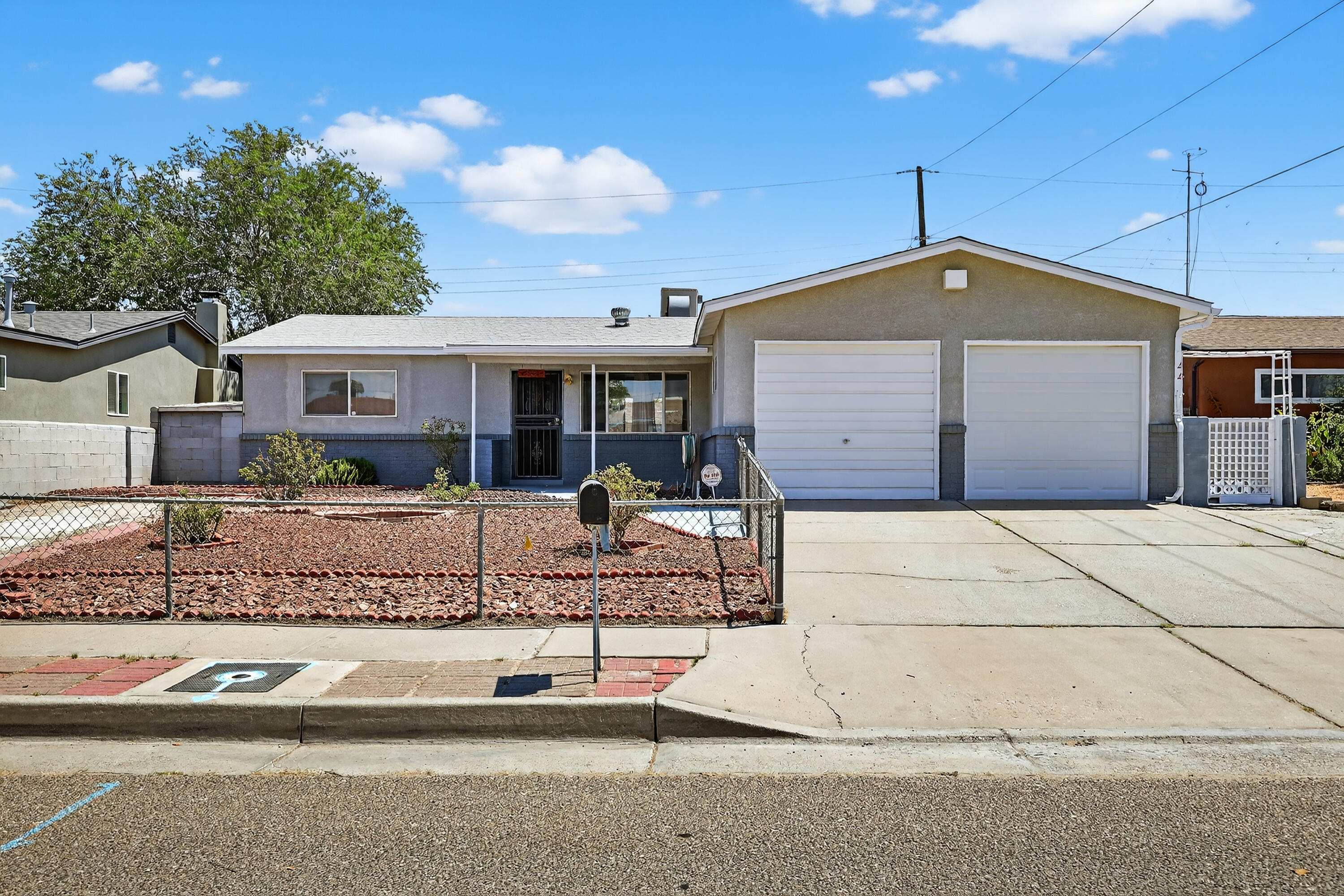 Welcome to your new oasis in Albuquerque! This charming single-story home boasts 3 spacious bedrooms & 2 bathrooms, perfect for a growing family or those who love to entertain. A generous square footage there is plenty of room to spread out and make this house your own. As you step inside, you'll be greeted by a bright and airy living space and an open floor plan that seamlessly flows from the living room to the kitchen. You will love the sleek countertops, modern appliances and ample storage space. Outside, you'll find a quaint backyard with patio, perfect for enjoying the warm Albuquerque weather. Whether you're hosting a barbecue with friends or simply relaxing with a good book, this outdoor space is sure to become your favorite spot. Don't miss your chance to make this your home!