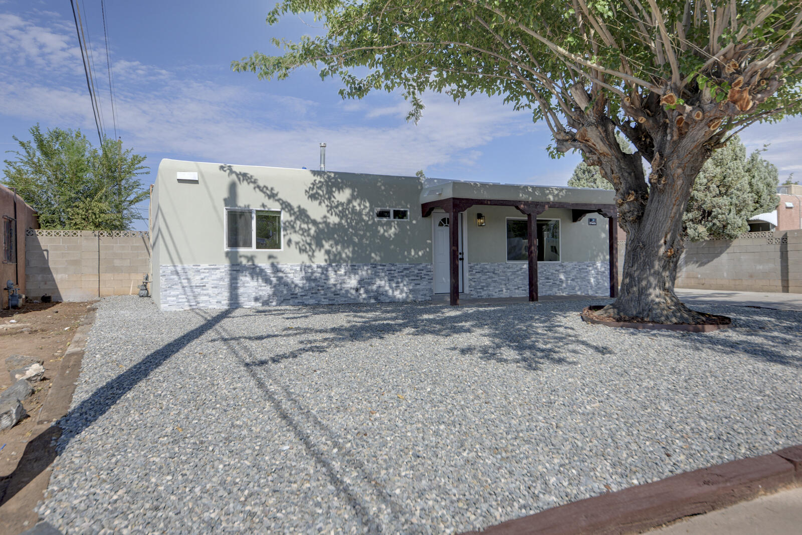 Welcome to this beautiful property located in the prestigious Uptown district of Albuquerque! This charming home boasts 3 spacious bedrooms and 2 bathrooms, perfect for families or those looking for extra space. custom kitchen w/granite countertops. making it a delightful space for cooking and entertaining.New Refrigerated A/C Unit, New Windows, & many more updates carried out across the entire home,The sizable yard offers plenty of outdoor space, perfect for relaxing or hosting gatherings.property is listed under market value at just $294,900, making it a fantastic opportunity for buyers.Conveniently located within walking distance to both Coronado Mall and Uptown Mall, you'll have easy access to shopping, dining, and entertainment.This is a must-see property