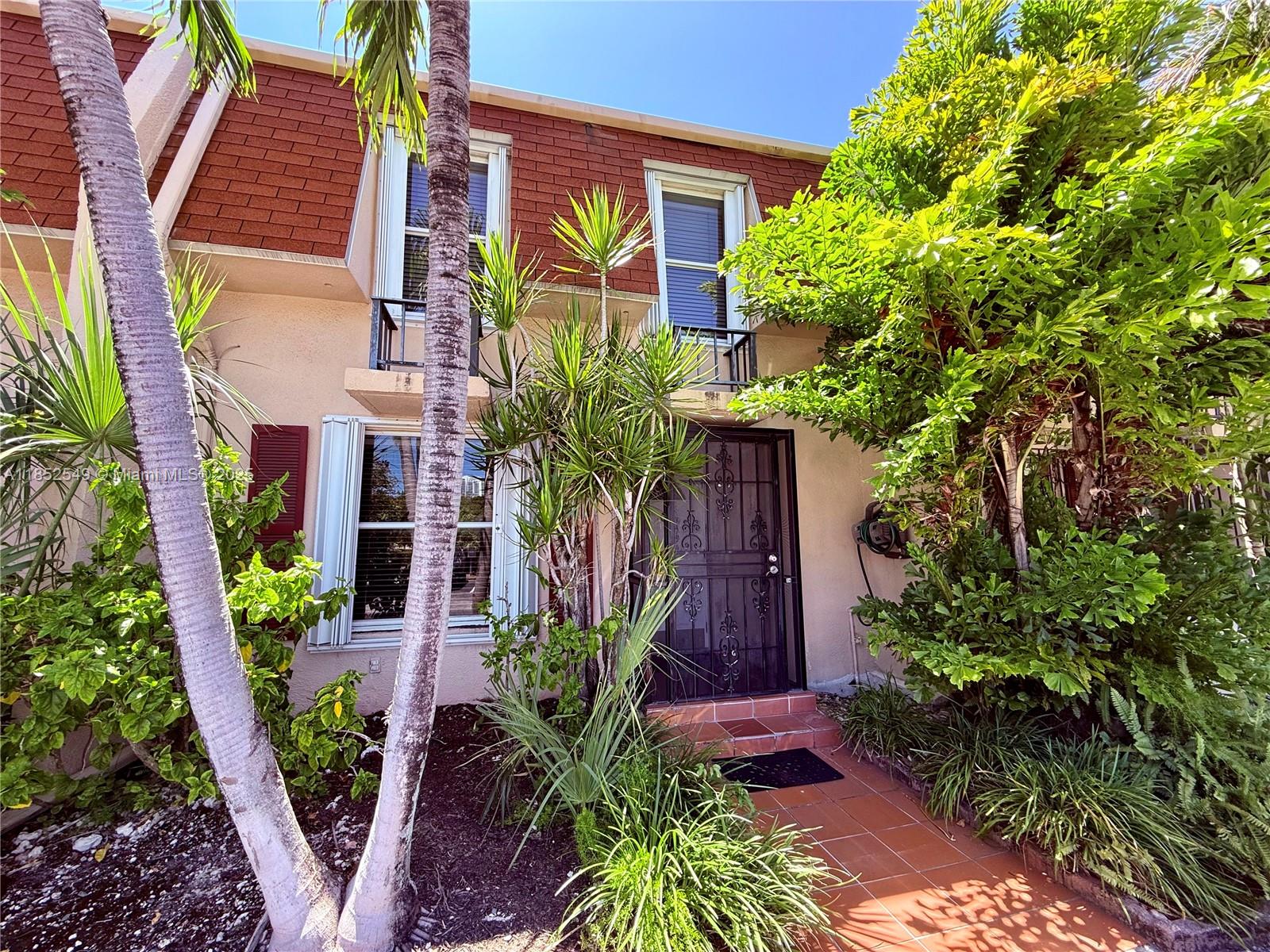This charming 2-bedroom, 3-bath townhome offers a perfect blend of comfort & practicality. The spacious bedrooms feature ample closet space & private en-suite bathrooms for convenience and privacy. The large enclosed patio includes a laundry closet for practicality, & views of lush landscaping, creating an inviting outdoor space ideal for relaxing or entertaining. The community amenities include a heated pool, tennis courts, saunas, & a clubhouse, providing plenty of options for recreation & leisure. Located 5 minutes from the beach & across from Joseph Scavo Park, residents can enjoy a dog park, playground, & walking path. Close to restaurants, shopping, & outdoor amenities, this home is perfect for those seeking a well-maintained residence with outdoor charm & easy access to everything.