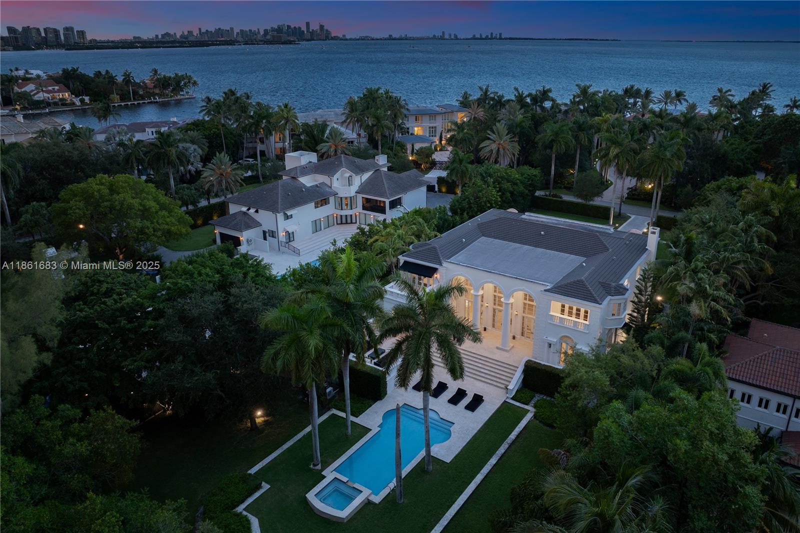 A true masterpiece of timeless elegance, this 6-bedroom, 6.2-bath estate spans over 9,400 sq. ft. in the private, guard-gated enclave of Tahiti Beach Island. Soaring double-height ceilings, marble and oak floors, and a newly designed chef’s kitchen set the stage for refined living.

Every detail has been thoughtfully curated—from the state-of-the-art movie theater to the seamless indoor-outdoor living experience. A media room, gym, and resort-style oasis with a heated pool, expansive lounge areas, and summer kitchen create the ultimate backdrop for both relaxation and entertaining.

Life at Tahiti Beach offers more than just a home—it’s a lifestyle. Residents enjoy a private beach, tennis courts, and clubhouse, along with the full amenities of Cocoplum. Avaliable furnished.