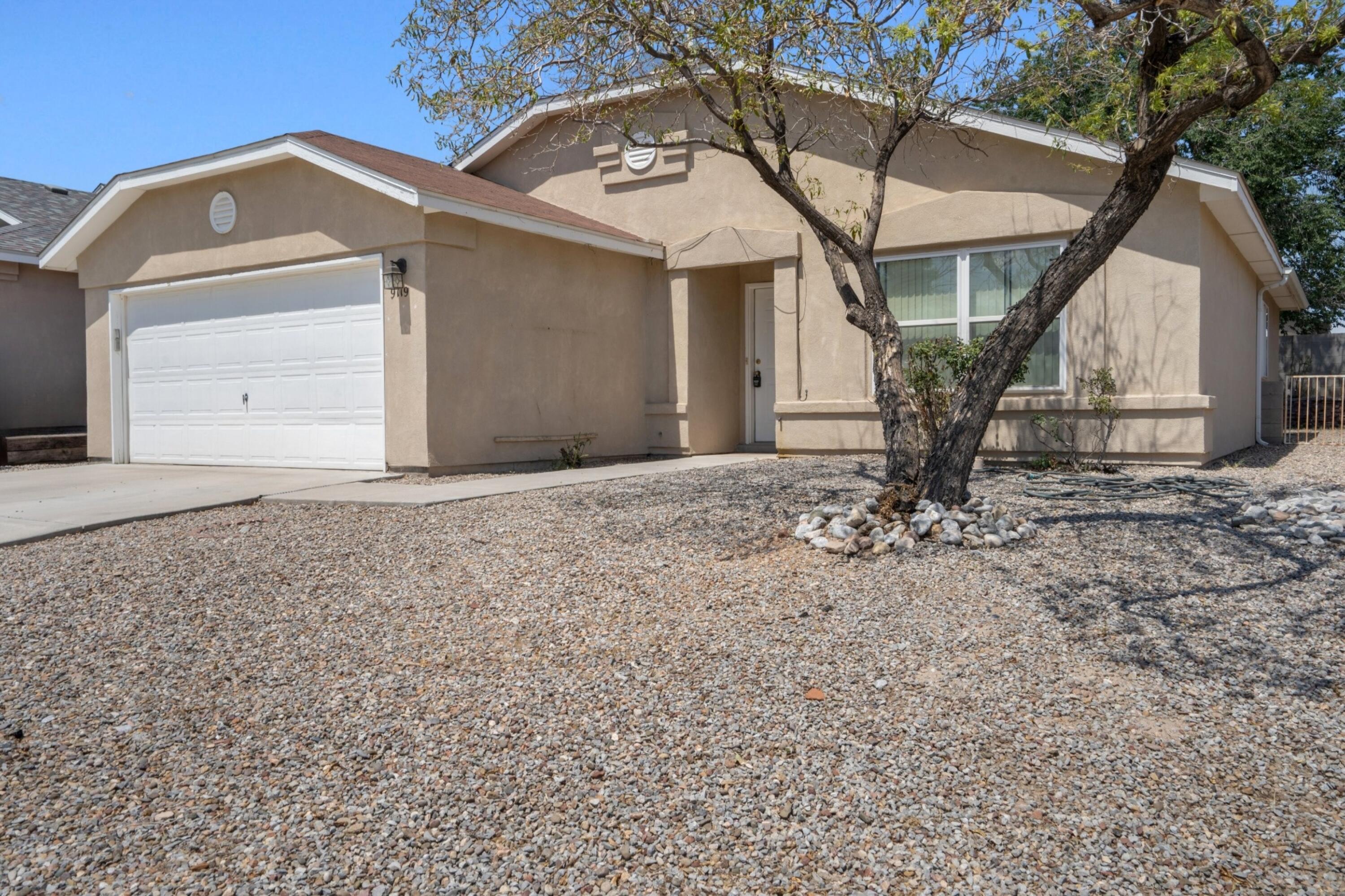 Charming single-story home with NO HOA, refrigerated air, featuring 3 bedrooms, 2 bathrooms, and a 2-car garage. Enjoy high ceilings, walk-in closets, and all appliances included. Relax on the large back patio in the walled yard, perfect for privacy. Located near parks and walking trails, this home offers comfort and convenience in a serene setting.