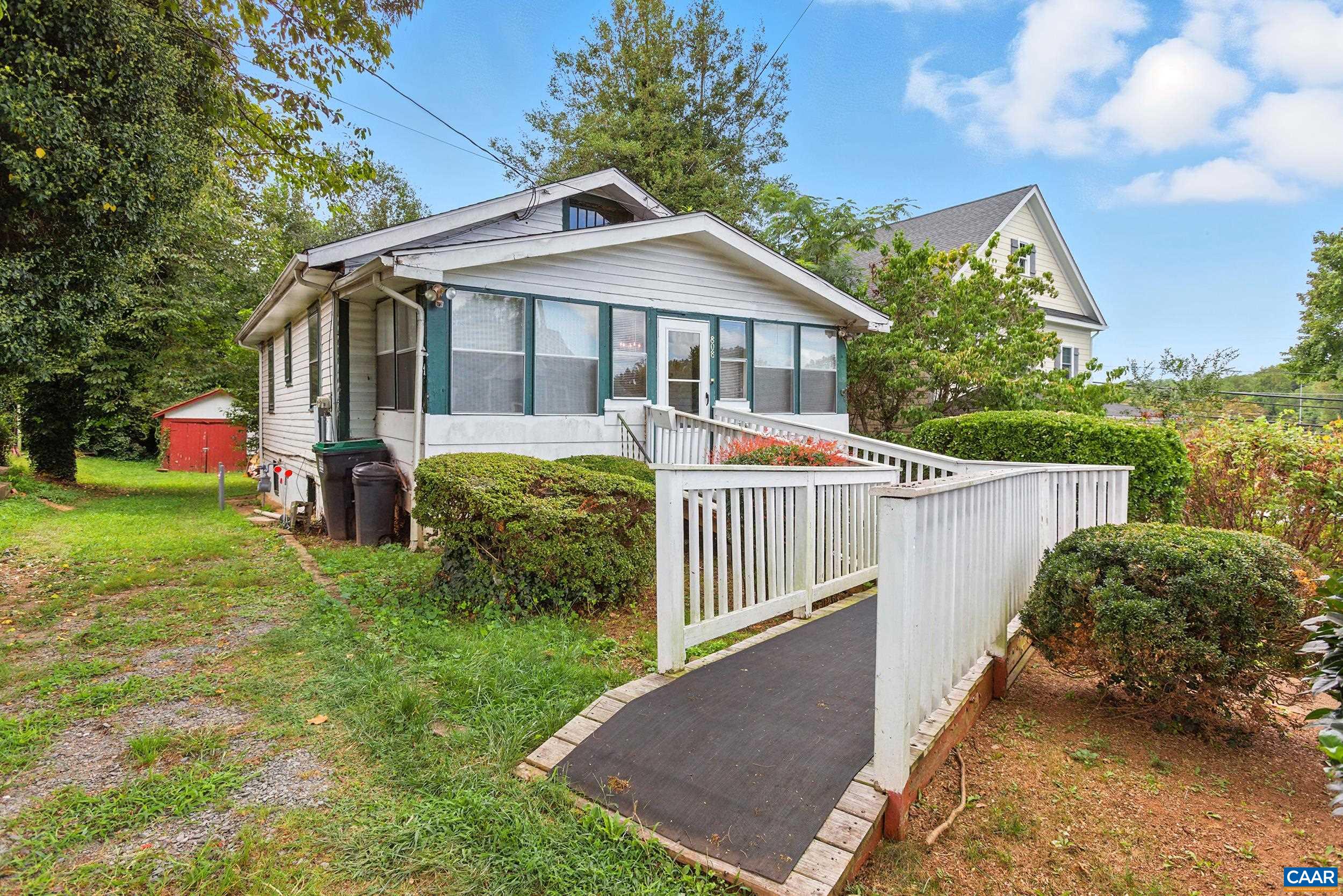 Welcome to this charming 2-bedroom, 2-bath single-family home offering 1,500 square feet of comfortable living space in a convenient Charlottesville location. Features include hardwood floors, a sunroom, a large front sitting porch, and a rear yard perfect for relaxing or entertaining. The lower level includes a bonus room, ideal for a home office, gym, or additional living area. Set on a nice lot, this home is ready for your finishing touches—a great opportunity for ownership or investment. Just minutes from the Downtown Mall, UVA Medical Center, and an array of dining and shopping options.  Don't miss the chance to make this home yours!  Book your tour today.