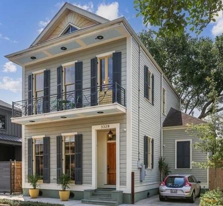 Stunning Bywater 2-story home buillt in 2016.  Meticulously crafted and thoughtfully designed, this residence  offers modern comfort with timeless New Orleans charm. Boasting 3 spacious independent bedrooms and 3 full bathrooms, the home features soaring 12-foot ceilings, custom plaster medallions, and a grand archway that sets the tone for its refined style.

The dramatic 2-story foyer inspires positive vibes highlighted by a marvelous staircase, warm heart of pine floors throughout (no carpet) and gas burning fireplace with custom one-of-a-kind oversized mantle. The gourmet kitchen shines with granite countertops, stainless steel appliances, and an open layout with surround sound perfect for entertaining. Oversized custom French doors lead to inviting front and rear balconies as well as a beautifully landscaped deck.

Additional features include two central HVAC systems, OFF-STREET PARKING, and abundant natural light. Just two blocks from Crescent Park and the Mighty Mississippi, this home places you in the heart of Bywater’s vibrant scene of neighborhood cafés, bistros, and unique shops.