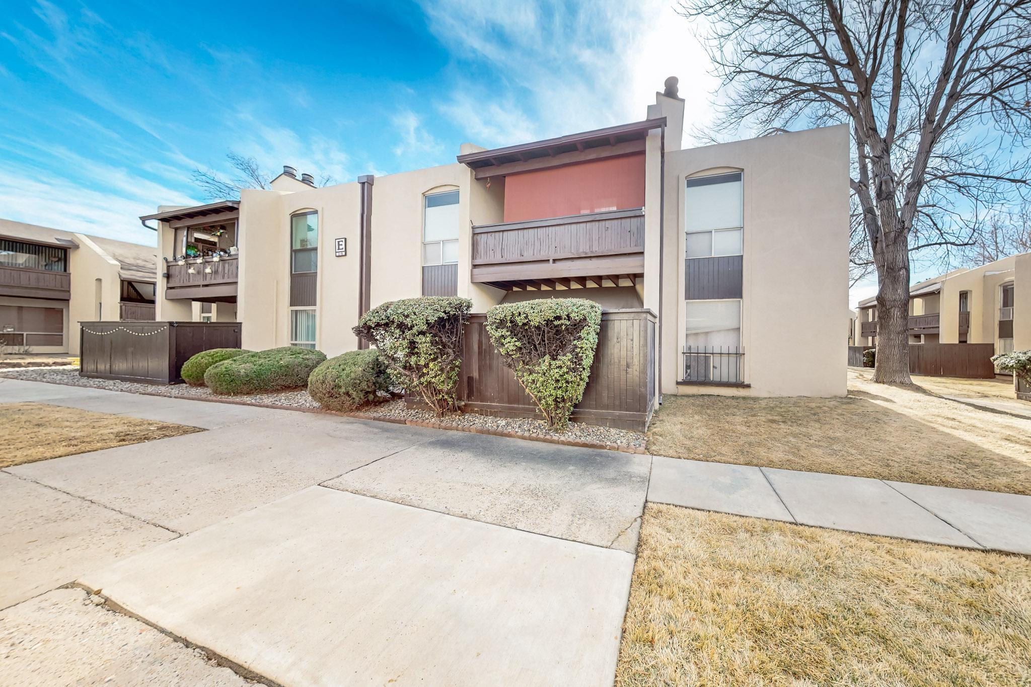 Stunning remodeled Uptown condo with a spacious one bedroom, large walk-in closet & den with wet bar. Perfect as an office or second bedroom. Features include ceramic flooring throughout, new appliances, and cozy wood-burning fireplace. Large living room/dining area with direct access to a large , fenced, private patio. HOA fees cover property taxes and utilities including refrigerated A/C for comfortable, worry-free living. Property amenities include indoor pool/Jacuzzi and two outdoor pools surrounded by lush landscaping. Prime location, adjacent to the new Winrock Town Center with theater, dining, markets, and easy freeway access. Near by Trader Joe's and multiple restaurants. Don't miss this opportunity to own at Uptown's most desirable community!