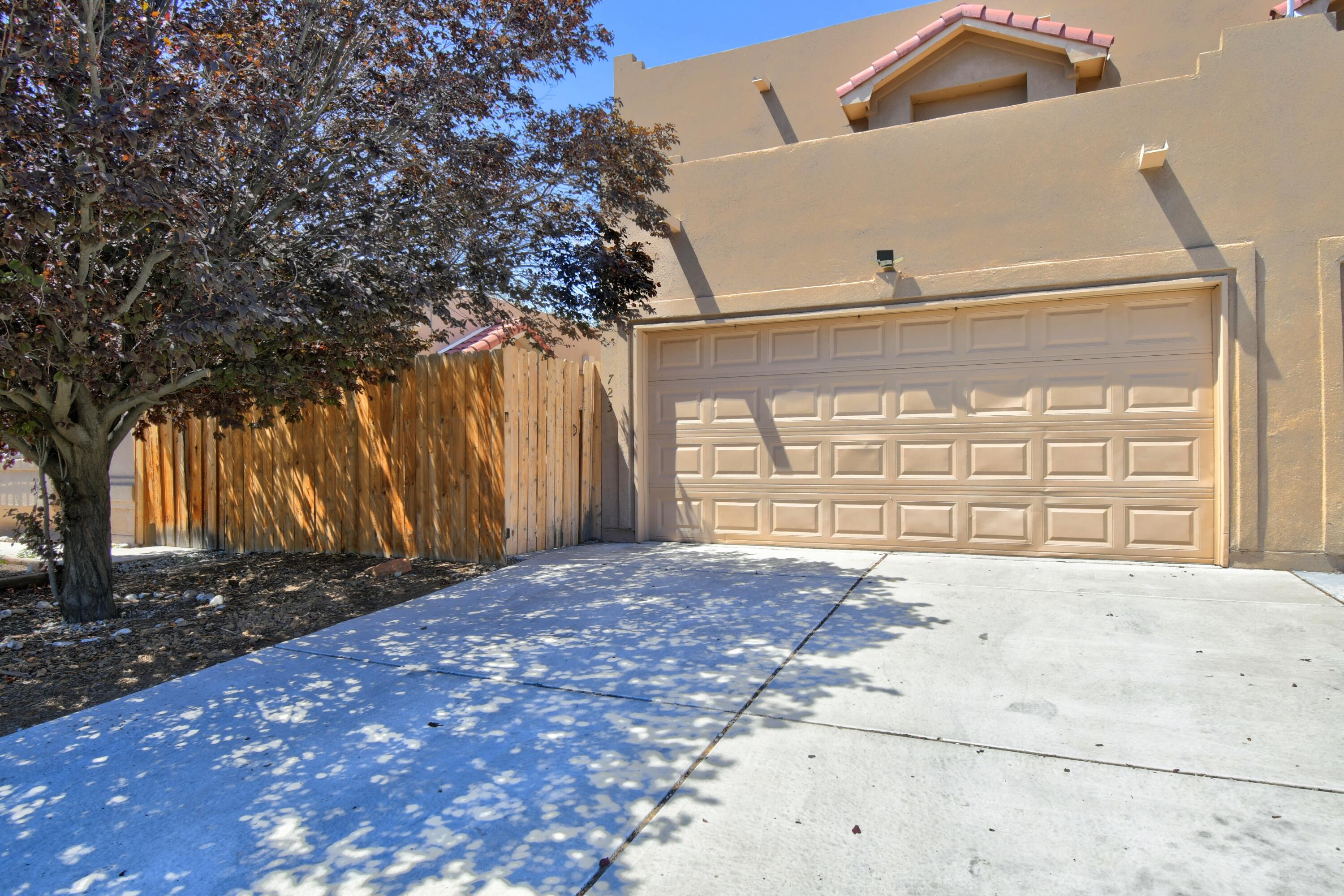 2 story charming townhome with open floor plan concept.  Courtyard entry leads you to a private walk way and back yard with easy care landscape.  The LR and DR were recently painted.  All appliances stay including the washer and dryer. Located in a convenient location near I40 and Coors Blvd.    Walking distance to West Mesa High School and swimming pool. NO HOA.