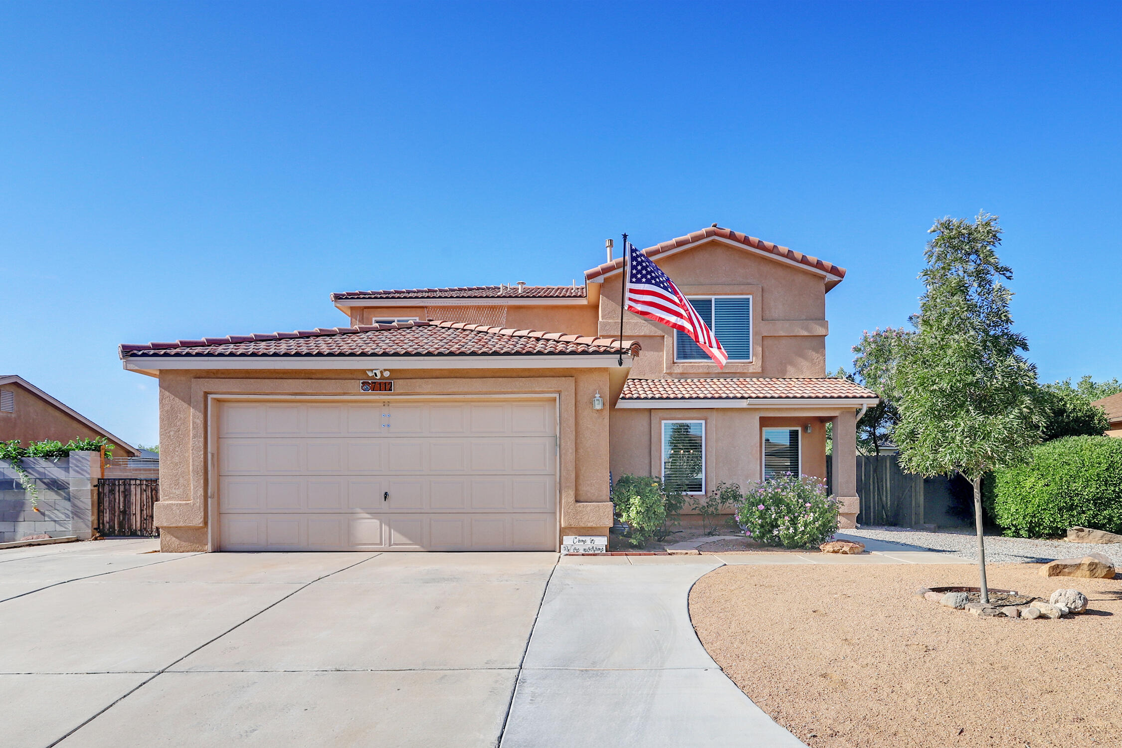 Spacious and UPDATED 5 bedroom home in Enchanted Hills no HOA! Primary suite is on the main level with 4 more spacious bedrooms and a full bath upstairs.  Recent updates  include new Pella windows throughout, newly remodeled kitchen shines with custom cabinets, SS appliances (less than 1 year) and granite counters, stylish wood look tile throughout the lower level, updated lighting fixtures & fans, new water heater.   The backyard is perfect for entertaining with Mountain View, an above ground pool (2 years old).  Chicken coop and chickens can stay.  Storage sheds come in handy for tools and toys!  Generous lot with backyard access.  Many shopping and dining options nearby and easy access to HWY 550 making it an easy commute to Santa Fe or Albuquerque.  Truly a special home!