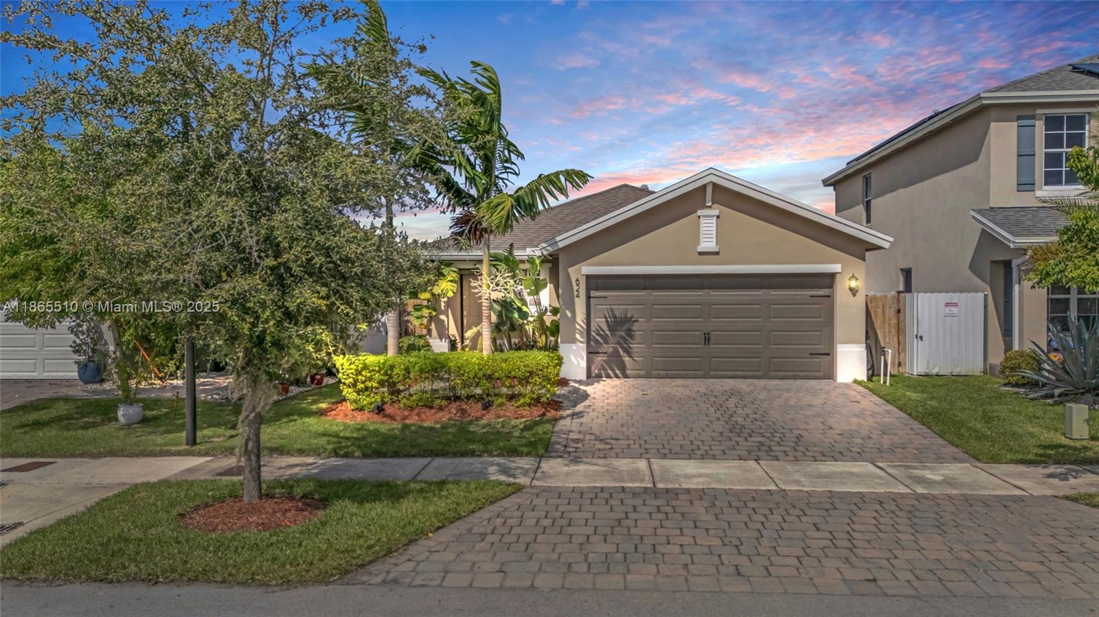 Amazing 3-bedroom, 2-bathroom home located in the heart of Florida City, built in 2019. This smart home offers a
bright and spacious living area, with a modern kitchen featuring stainless steel appliances, ample cabinetry,
granite countertops, and a convenient breakfast bar. The large, carpeted bedrooms provide comfort, with the
master suite boasting an en-suite bathroom with dual vanity sinks and a walk-in shower. The fenced backyard is
perfect for outdoor activities, gardening, or simply relaxing, and it includes a patio area. Additional highlights
include a 2-car garage. Situated in a peaceful neighborhood, this home is just minutes from shopping, dining,
parks, and major highways. Don’t miss the chance to make this lovely home your own!
