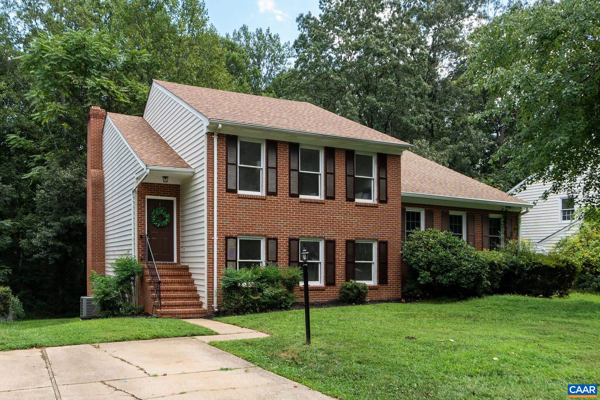Welcome to 1511 Westfield Ct in Charlottesville — a freshly renovated attached single-family home with 3 bedrooms, 2.5 baths, and nearly 2,000 sq ft of living space. Tucked away on a quiet cul-de-sac in the sought-after Wynridge/Rio area and surrounded by lush mature trees, this home sits in an unbeatable location. Updates include a brand-new 30-year Certainteed architectural shingle roof; HVAC (2019–2020 American Standard Heat Pump) just serviced and enhanced with a RemeHalo air purifier, new parts, and ducts cleaned; plus electrical and plumbing upgrades with Pex throughout. The kitchen has new quartz countertops and stainless steel appliances, open-plan and spacious living areas, two cozy wood-burning fireplaces, and a spacious deck with an easy-care yard for outdoor living. Fresh paint, new flooring, updated fixtures & hardware, plus modern touches. Part of the Minor Hill Manor Homes HOA (handles trash, $85/qtr), this turnkey home is minutes from shopping, dining, schools, and commuter routes. Walk to the 25-acre Charlotte Humphris Park, featuring 1.5 miles of paved trails and a little free library. Move-in ready—pack your boxes and schedule your tour today! Video Tour Available!