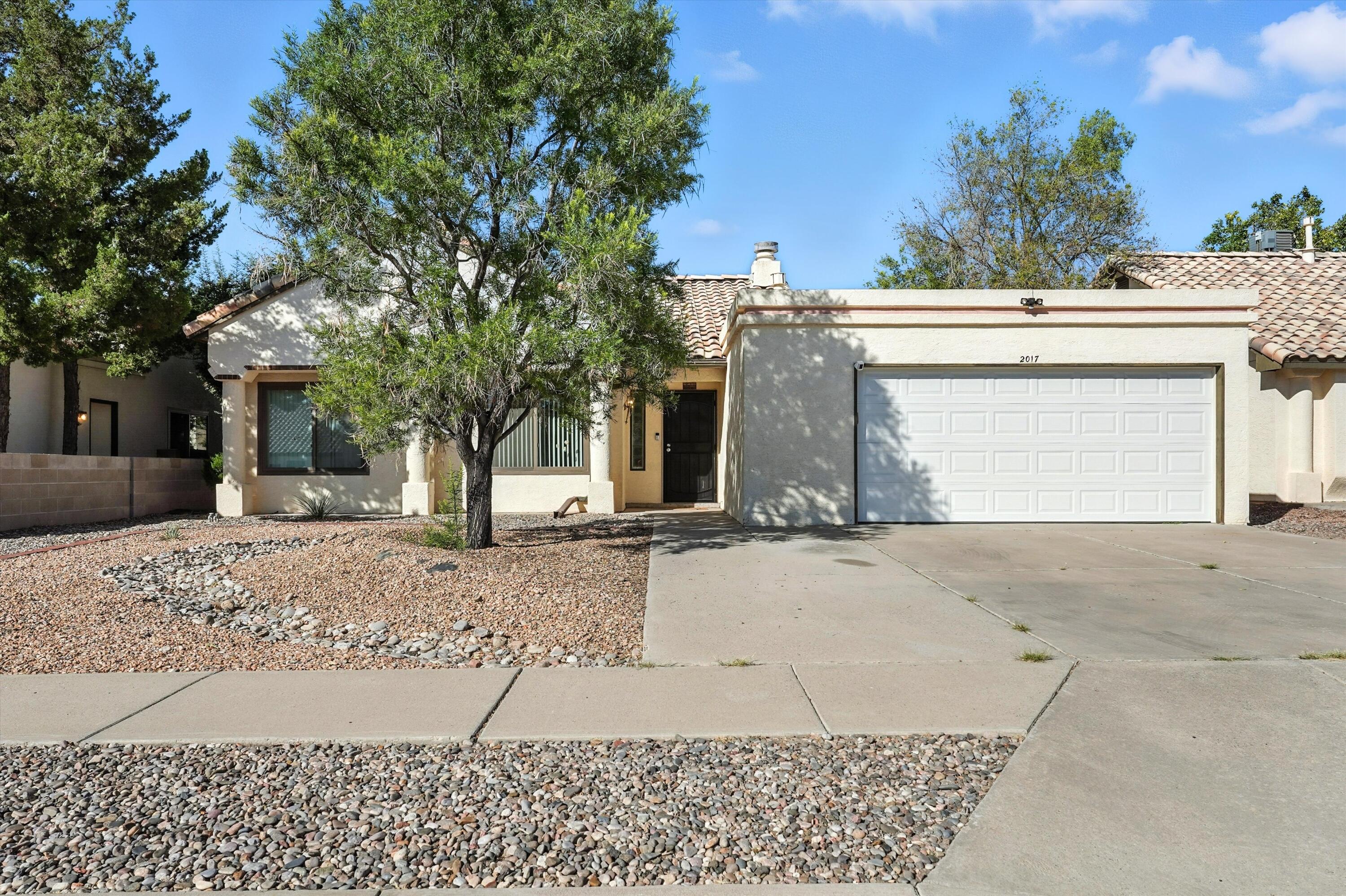 Welcome to your dream home in the coveted Laurelwood neighborhood! This 3-bedroom 2-bath home is a stand out gem. The heart of the home is the upgraded kitchen with beautifully tiled backsplash, granite countertops and ample cabinets. The dining area, perfectly positioned near the stunning floor-to-ceiling tiled fireplace, provides a welcoming space for family meals or entertaining. Homes here are in high demand, so don't miss your chance to make this one yours before it's gone!