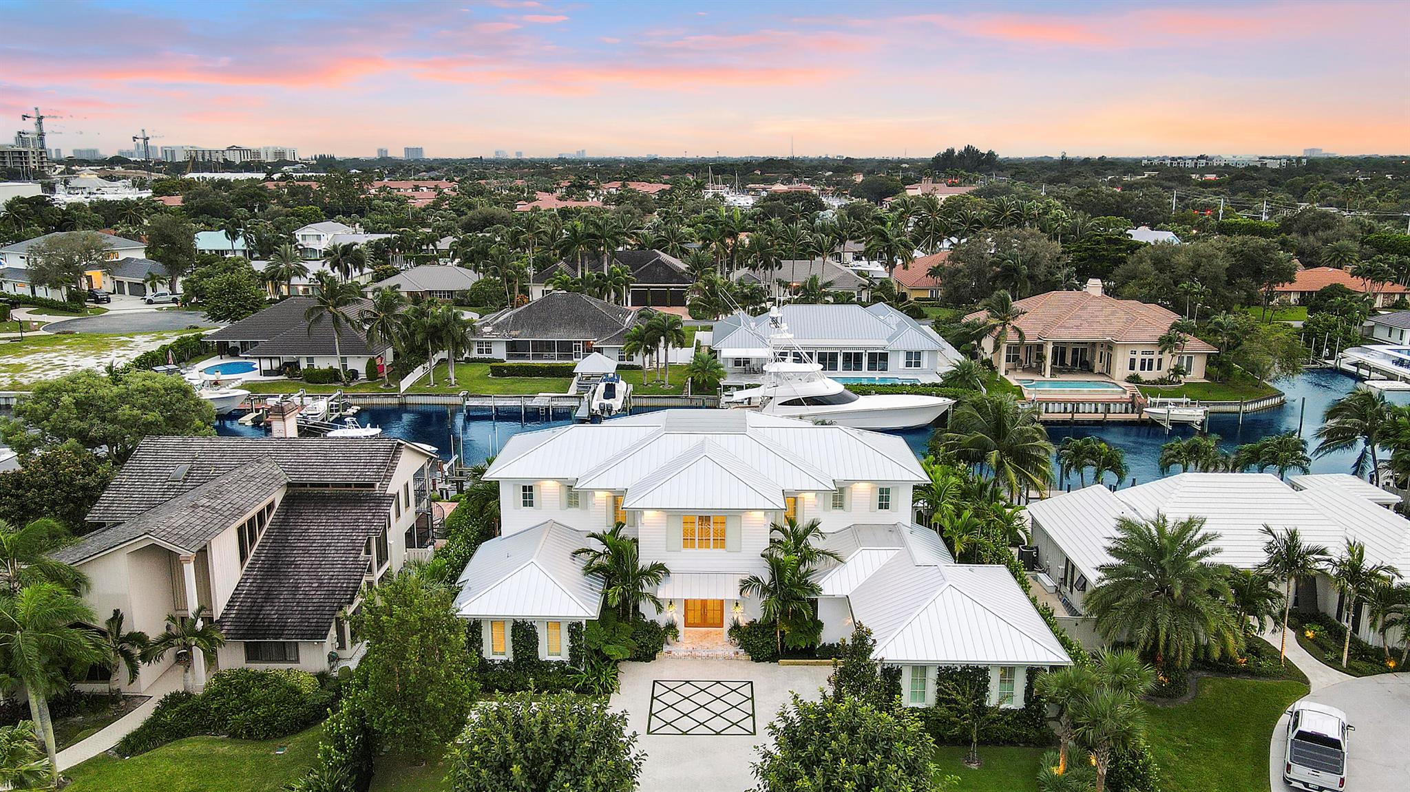 Build your dream estate in the highly coveted Village of North Palm Beach! This custom waterfront property presents a rare opportunity to own nearly an acre (0.8335 acres) with 107 feet of prime water frontage on the scenic Earman River. Custom architectural plans by renowned luxury builder Foster Banyan Building & Development envision an elegant residence with 5 bedrooms, 5 full baths, 2 half baths, an office, and a den, all within 5,180 A/C sq. ft. and 7,508 total sq. ft. Unique to this property, the oversized lot allows for design flexibility, including an optional 1,000 sq. ft. casita(estimated $650,000) or additional garage. The casita design offers a private 1-bedroom, 1-bath guest retreat with family room, morning bar, separate laundry, and a breezeway connection to the main home. The Village of North Palm Beach is one of Northern Palm Beach County's most desirable communities, offering direct access to the Palm Beach and Jupiter Inlets for world-class boating and fishing. Residents enjoy proximity to pristine beaches, fine dining, and Palm Beach International Airport. The newly renovated North Palm Beach Country Club is the crown jewel of the Village, featuring a Jack Nicklaus Signature Golf Course, tennis facility with Har-Tru courts, Olympic pool with splash pad, restaurants, banquet facilities, and more&#x14;all open to the public. With its coastal charm, golf cart-friendly designation, and luxury lifestyle, North Palm Beach is quickly becoming one of South Florida's top destinations.