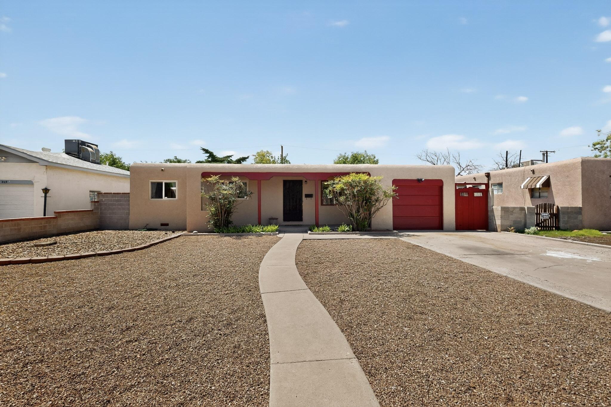Charming, cozy, and affordable! This delightful 3-bedroom, 1-bathroom home in SE Albuquerque has been freshly painted inside and out and is truly move-in ready.Step inside to find beautiful hardwood and tile flooring throughout. The streamlined kitchen features a spacious bay window that fills the room with natural light, along with, stainless steel appliances, a large pantry, and recessed lighting.Three comfortable bedrooms offers generous windows that allow in bright, warm sunlight and a centrally located full bathroom. The private, landscaped backyard provides ample space for entertaining or simply unwinding after a long day.Conveniently located near Kirtland AFB, UNM, shopping, dining, and more, this home offers both comfort and accessibility. Don't wait--this one won't last long